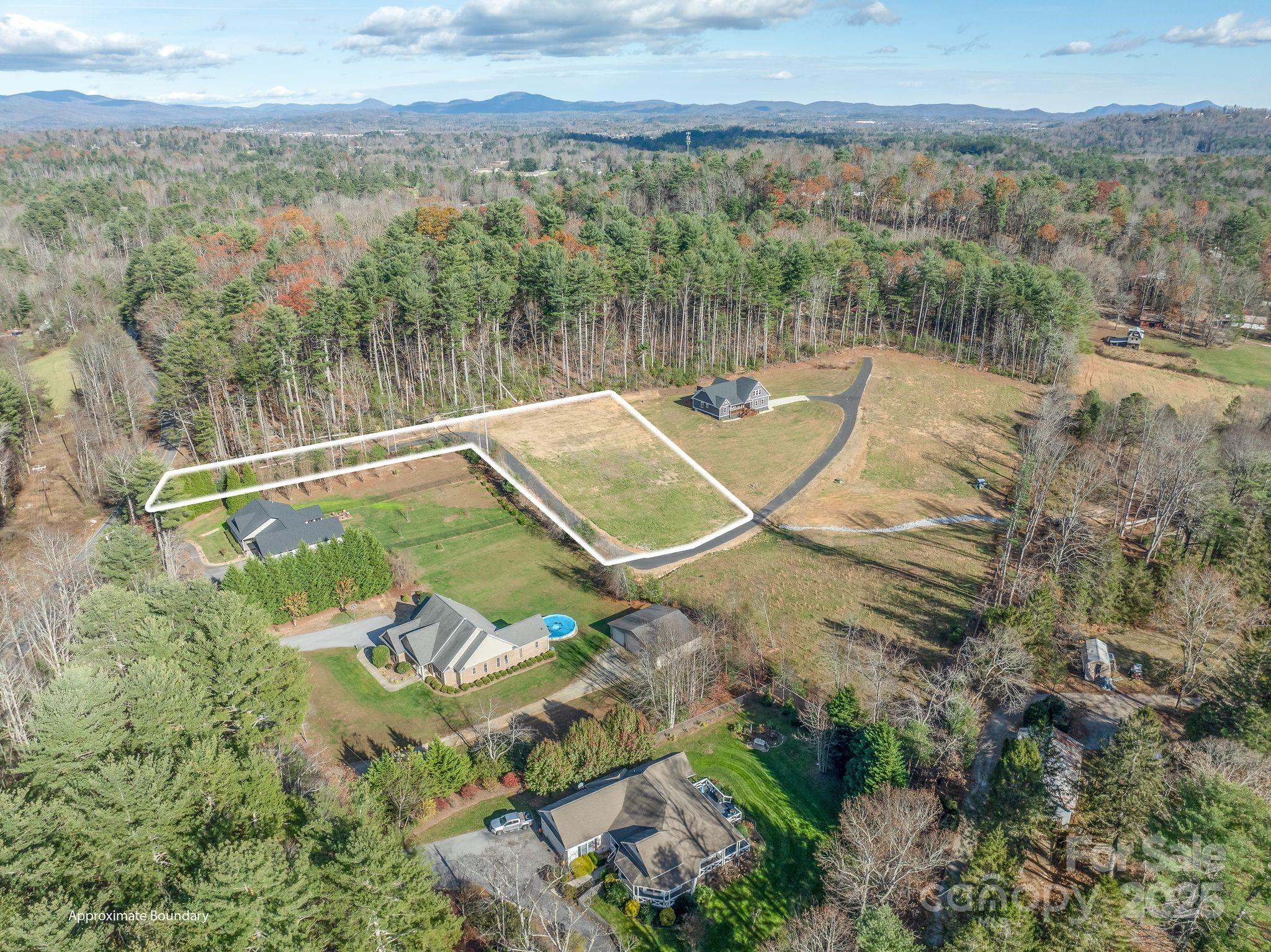 This 1.37-acre cleared lot is your blank canvas to create the mountain retreat of your dreams. Ready for immediate construction, this property offers the convenience of city water, allowing you to bring your vision to life without delay.

Enjoy the freedom to design and build a custom home that perfectly suits your lifestyle and preferences. Whether you envision a cozy cabin or a spacious mountain lodge, the possibilities are endless.

Being in a prime location, you'll have easy access to the vibrant towns of Hendersonville and Brevard, offering a range of amenities, dining, and shopping options. And for outdoor enthusiasts, the breathtaking natural beauty of DuPont State Forest is just a short drive away.

Also listed as part of MLS 4225212