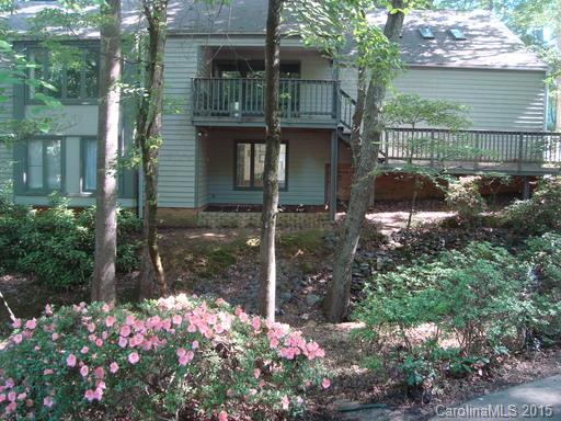 GOLF COURSE HOME with stunning views! Fabulous gourmet Kitchen w/ granite, SS appl., gas cooktop is open to GR with fireplace.  Wet Bar. Extensive HWs. Open doors to rear deck to entertain inside and out. Spacious main level Master Suite w/deluxe bath. Upstairs has Bonus/Bedroom + Rec Room. Lower level has 2 BRs, workout room + utility.  Loads of space for everyone and everything. Golf cart parking under house. Patio with outdoor fireplace is guaranteed to be a favorite spot!