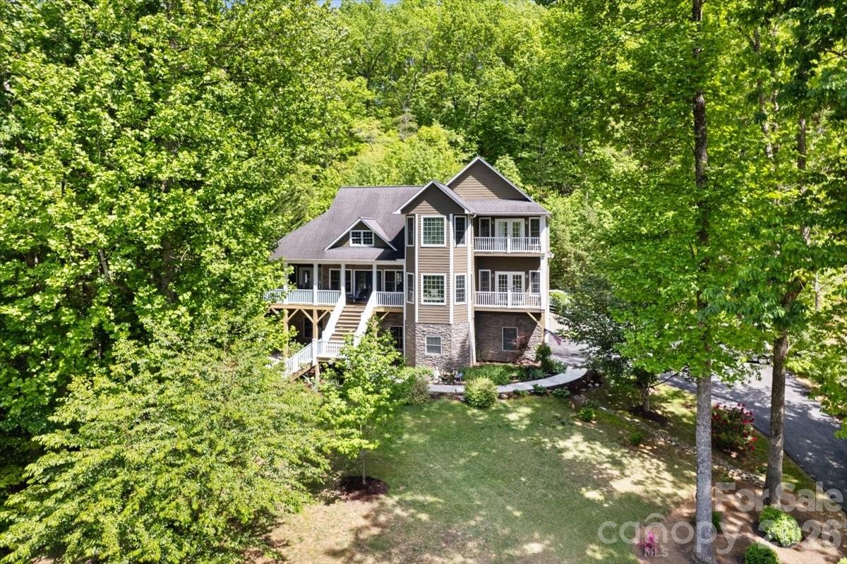 Well maintained, 3 bed, 3 bath home in picturesque setting. With balconies on both the primary bedroom and one of the upstairs bedrooms, you can enjoy the beauty of the mountains from sunup to sundown. Walk right out onto the shady deck from the large, versatile bonus room on the first floor. Plenty of space for friends and family but if you want more, the basement is ready to be finished with plumbing stubbed up. Large garage with space for two cars, lawn equipment, and extra storage. Back yard is fenced in and ready for your furry friends. Just minutes from I-40, you can be in Black Mountain in under 20 minutes or you can drop the boat in Lake James in just over 30 minutes.