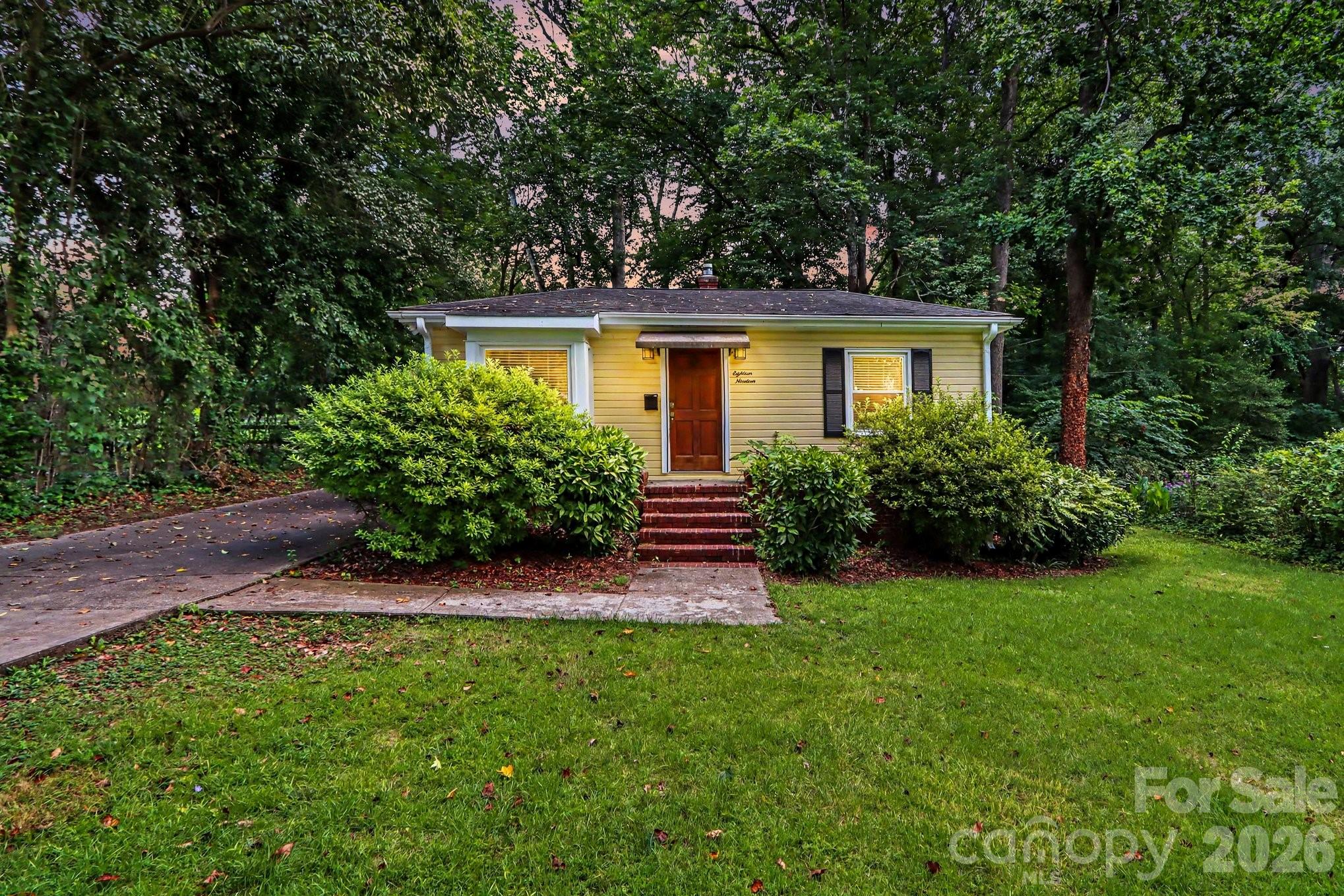 Nestled on a rare, oversized 0.35-acre lot in Charlotte's sought-after Merry Oaks neighborhood, this charming bungalow offers endless possibilities in one of the city's most desirable and rapidly growing areas. Whether you're looking for a move-in-ready home, the perfect place to renovate and expand, or an exceptional homesite for your future vision, this property presents a unique opportunity.

Inside, you'll find a bright, inviting living space filled with character and natural light, while the expansive backyard provides plenty of room for entertaining, gardening, creating your own outdoor retreat, or future expansion. Mature trees and established landscaping offer both beauty and privacy—features that are becoming increasingly rare this close to Uptown.

Ideally located just minutes from Plaza Midwood, NoDa, Commonwealth, and Uptown Charlotte, you'll enjoy easy access to some of the city's best local restaurants, breweries, coffee shops, parks, and entertainment while still enjoying the charm of an established neighborhood.

Properties with this combination of location, lot size, and potential are becoming increasingly difficult to find. Don't miss your chance to own a special piece of one of Charlotte's most vibrant neighborhoods.