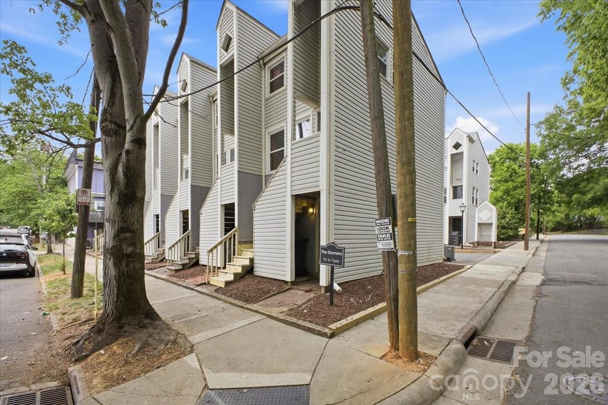 Turnkey, fully furnished, and in the heart of Uptown! This end-unit, three-story condo offers the perfect blend of city lifestyle, flexibility, and convenience in one of Charlotte’s most desirable neighborhoods. Located in the historic Fourth Ward district, this 1-bedroom, 1-bath home places you just moments from everything Uptown Charlotte has to offer—top dining, coffee shops, parks, and entertainment. Enjoy easy access to the LYNX Blue Line, making commuting or exploring South End and NoDa effortless.

Inside, the home is move-in ready with a thoughtfully designed interior and is offered fully furnished, with all furniture included - creating a seamless transition for its next owner.

A standout feature for Uptown living, this condo includes a rare 1-car garage providing secure parking and additional storage—an amenity that adds everyday convenience and broad appeal.

The flexibility of this property truly sets it apart. With no rental restrictions, it allows a variety of ownership options—from full-time living to leasing or corporate housing. Its prime location near destinations like Romare Bearden Park and Truist Field further enhances its long-term desirability.

As an end-unit positioned on a corner, the home benefits from added privacy, increased natural light, and fewer shared walls. Whether you're looking for a low-maintenance home or a property with versatile use in one of Charlotte’s most walkable neighborhoods, this Fourth Ward residence delivers on location, lifestyle, and opportunity.