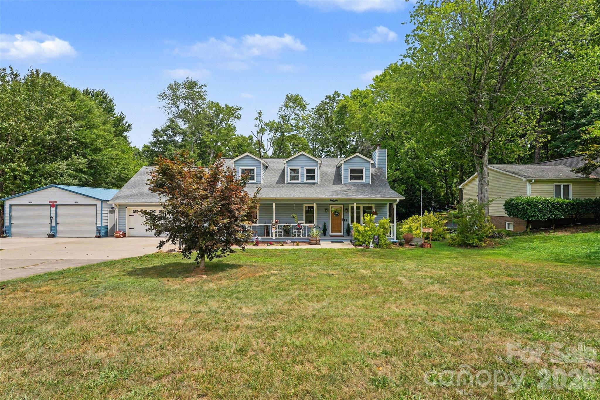 Welcome to this stunning beauty with stunning wood detailing throughout, primary suite DOWN, wood burning fireplace, rocking chair front porch, large and private backyard, multiple storage sheds offering versatility and additional space to be creative. This home has been lovingly cared for with upgraded LVP flooring throughout most of the downstairs space. All new windows in 2020 along with a new wooden front door. Upstairs is a loft space along with two large bedrooms and a full bathroom. This one will not last long!