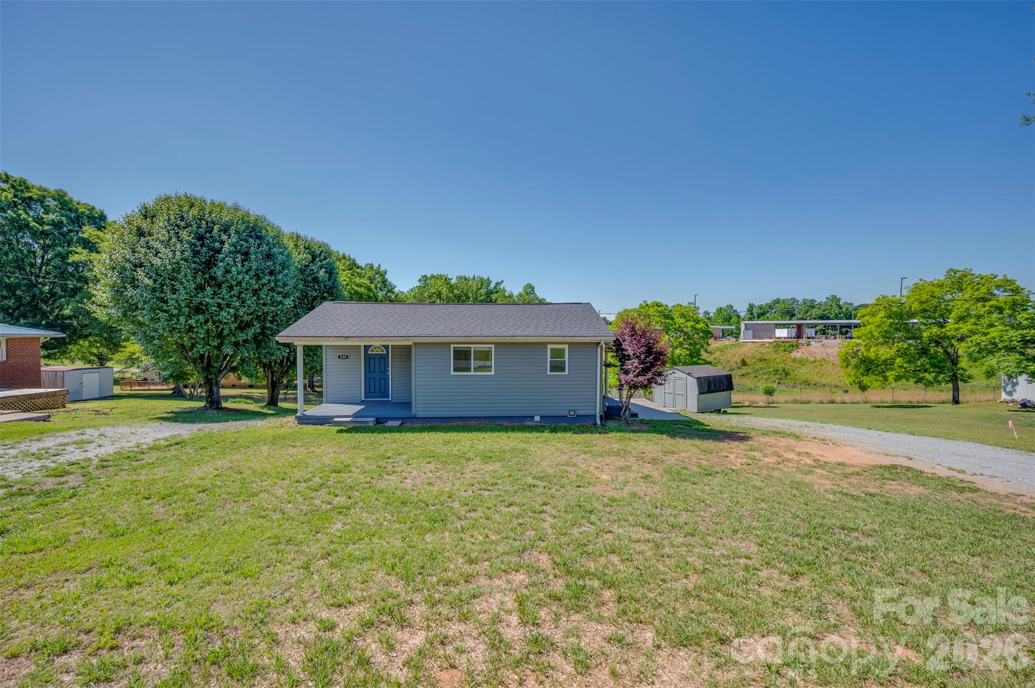 Check out this one of a kind, super cute property in the heart of Forest City!  Thoroughly renovated w/easy-care vinyl plank flooring, white cabinetry w/granite tops, stainless appliances & recessed lighting, this adorable cottage presents a truly unique opportunity. The main level offers a very efficient one bedroom living situation complete with a full kitchen, living room, full bath & stack laundry unit.  Cozy front porch entry as well as a side entrance into the kitchen.  At the rear of the home, enter a second living quarters from a private entrance.  Roomy living area, bedroom plus bonus room, full bath w/laundry closet & an updated compact kitchen.  All new vinyl siding, new windows, new electric heat pumps and a snazzy new roof.  Public utilities and high speed internet available.  This is the perfect place for multigenerational living, friends looking to share expenses while maintaining privacy, or low-maintenance home with rental potential.
