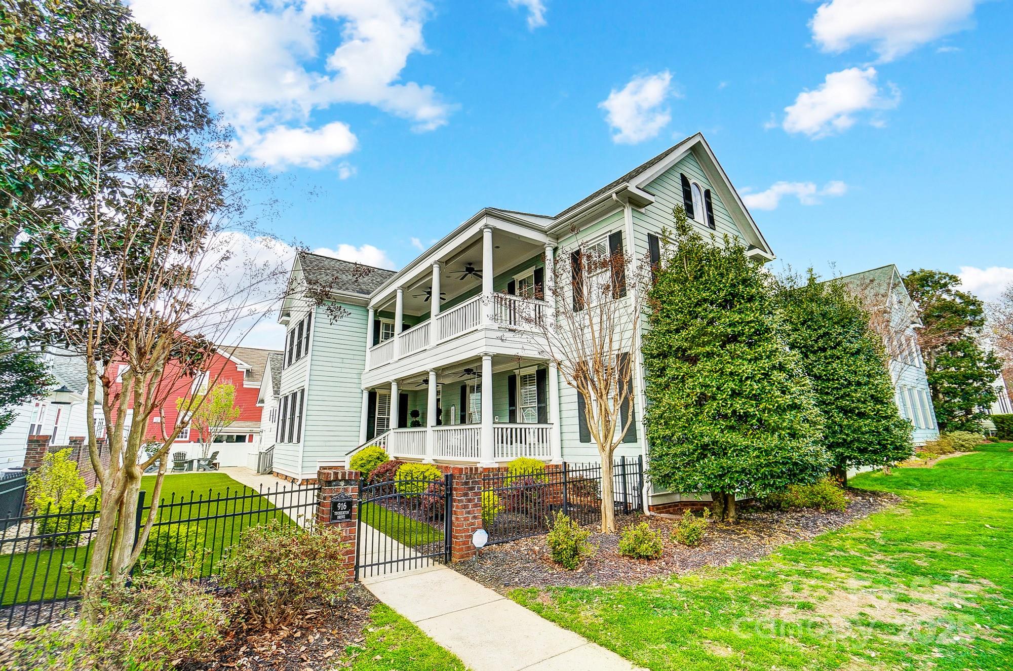 Gorgeous Charleston-style home in the heart of Baxter Village! This beauty offers four spacious bedrooms, which can also be utilized as three bedrooms, and a huge bonus with an ensuite. The completely updated kitchen is a chef’s dream, featuring custom cabinetry, high-end appliances, appliance garages with electrical and plumbing, and a stunning island. The butler’s pantry includes double built-in mini fridges, a beverage center, custom shelving, and lighting, just perfect for entertaining. Incredible office with live edge counters. Enjoy the double porches that provide a charming space to relax and unwind, or the private courtyard with a custom patio that is ideal for outdoor gatherings. The new homeowner will also have the opportunity to choose a new hardwood floor stain, to be completed after closing. With every detail carefully curated, this home offers the perfect combination of elegance, comfort, and luxury in a prime location, just steps from a Baxter pool and playground!