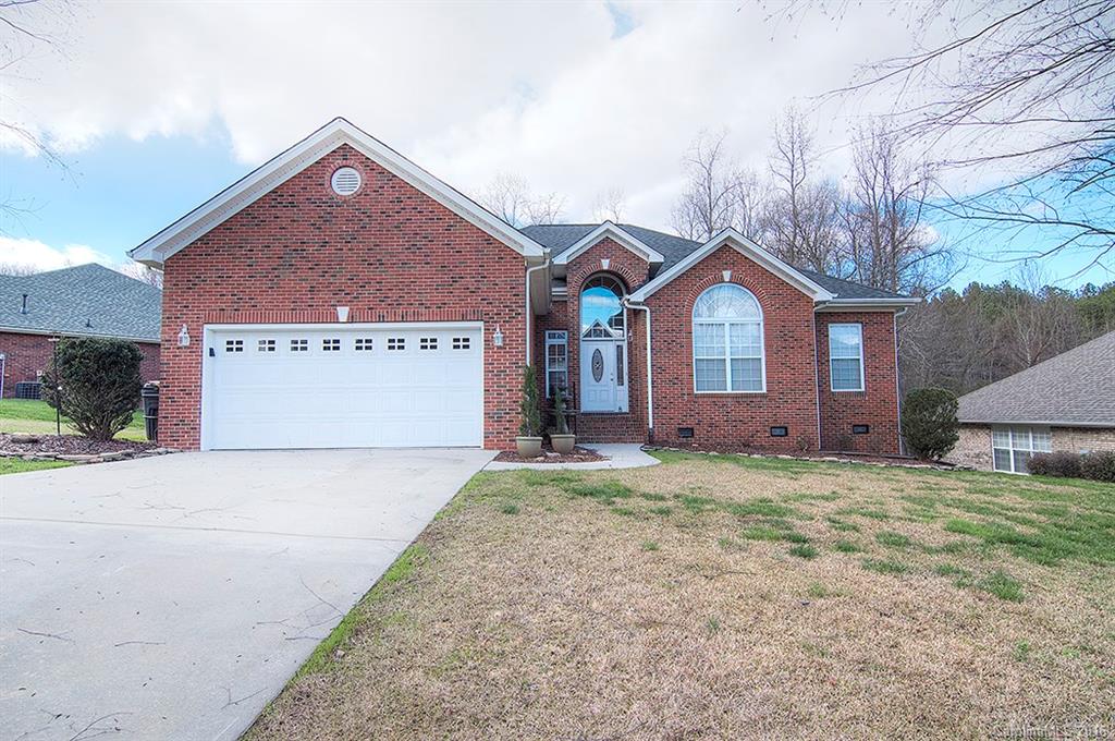 Beautiful brick ranch in Palmetto West. Open floor plan with hardwood floors. Dining & Living area has crown molding. Large master with dual vanities & closets and garden tub. Additional bedrooms with spacious closets. Hall bath has double sink vanity & large closet. Laundry room w sink & closet. Screened porch and sunroom. Dog run in large, fenced back yard. Fantastic workshop space with garage door to yard. Sold As Is, no repairs to be made.
