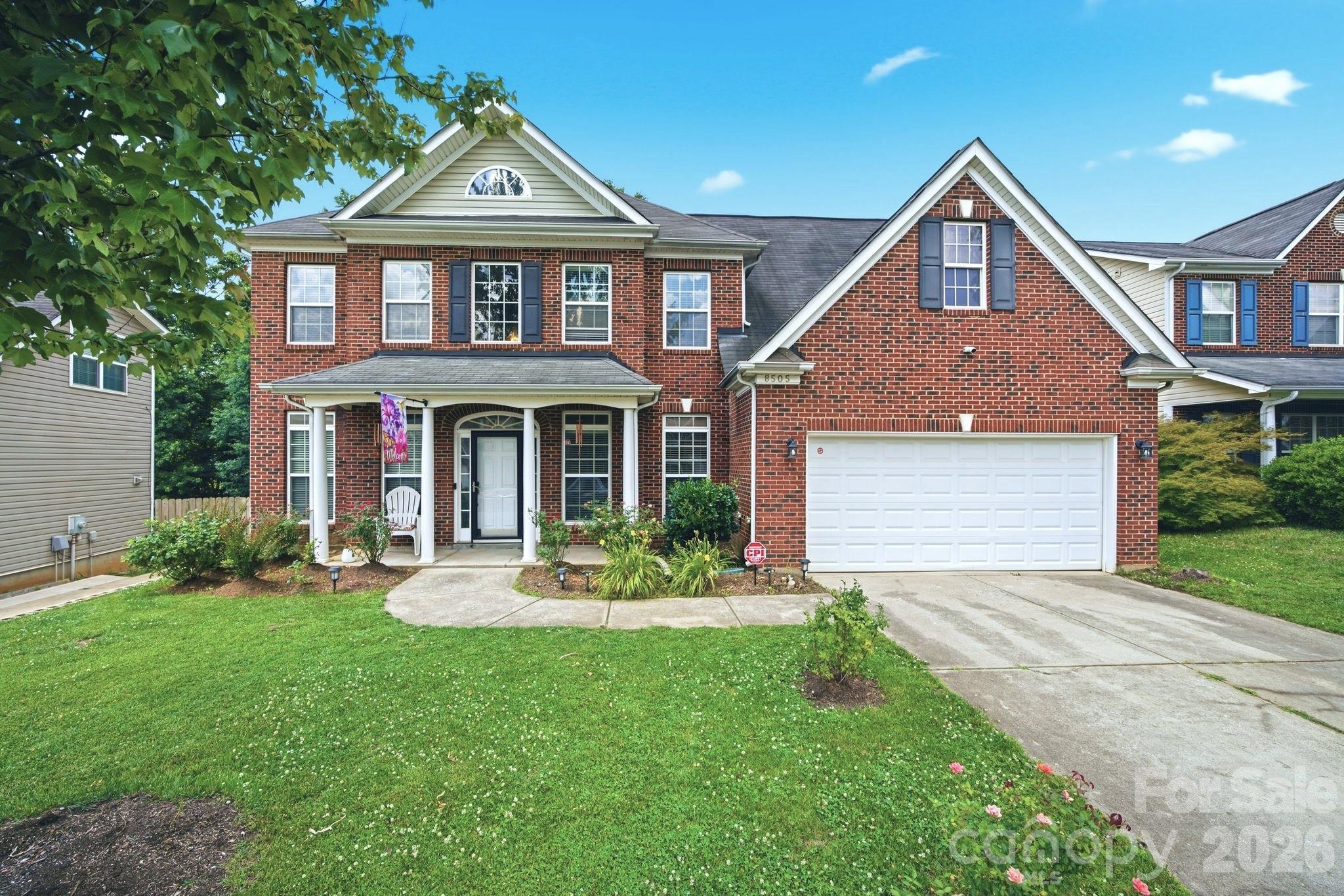 Welcome home to this spacious 4-bedroom, 3-bath residence offering nearly 3,000 square feet of comfortable living space in the highly desirable Hampton Place Community. A charming front porch welcomes you inside, where you'll find a classic floor plan featuring a formal living room with a fireplace, dining room with crown molding, and a private office with French doors—perfect for working from home. A guest bedroom and full bath on the main level provide flexibility for visitors, multigenerational living, or additional workspace.

The kitchen features granite countertops, ample cabinetry, and generous workspace for everyday living and entertaining. Hardwood floors add warmth and character throughout much of the home.

Upstairs, the oversized primary suite has a trey ceiling, large walk-in closet, garden tub, and separate shower. Additional secondary bedrooms offer both comfort and ample storage.

Outside, the fenced backyard is surrounded by mature trees, creating a peaceful and private outdoor setting. This community also offers desirable amenities.

Major updates include a newer HVAC system (approximately 3 years old), water heater (approximately 2 years old), GE whole-house water filtration system, and both interior and exterior CPI security systems. While the home could benefit from some cosmetic updates, the seller is willing to offer a concession toward paint and carpet, providing a fantastic opportunity to personalize the space and build equity.

Ideally located near I-485, Concord Mills, Trader Joe's, UNC Charlotte, shopping, dining, hospitals, and entertainment. Charlotte Douglas International Airport is less than 30 minutes away, offering convenience for visitors as well as travelling.  Don't miss this opportunity to own a spacious home with valuable updates, a great floor plan, and an unbeatable location.  Buyers Agents Welcome!