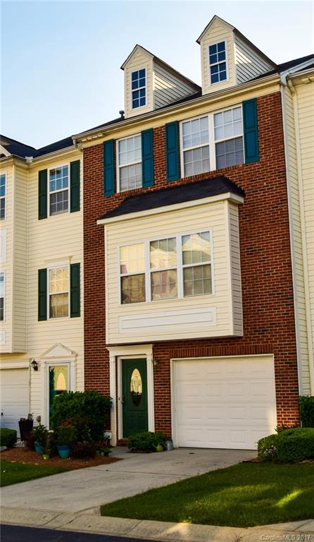 Enjoy the ease & convenience of Townhome living in one of Fort Mill's favorite & convenient neighborhoods. Ground level has parquet entry, single car garage, cozy den w/ half bath that opens to private patio backing up to wooded area. Middle level features lovely kitchen w/ lots of cabinet space, dinning area, great room w/ gas fireplace. Walkout to private deck overlooking wooded area. Upper level has master suite w/ double sinks & garden tub. 2 other beds w/ bath. All kitchen appliances remain