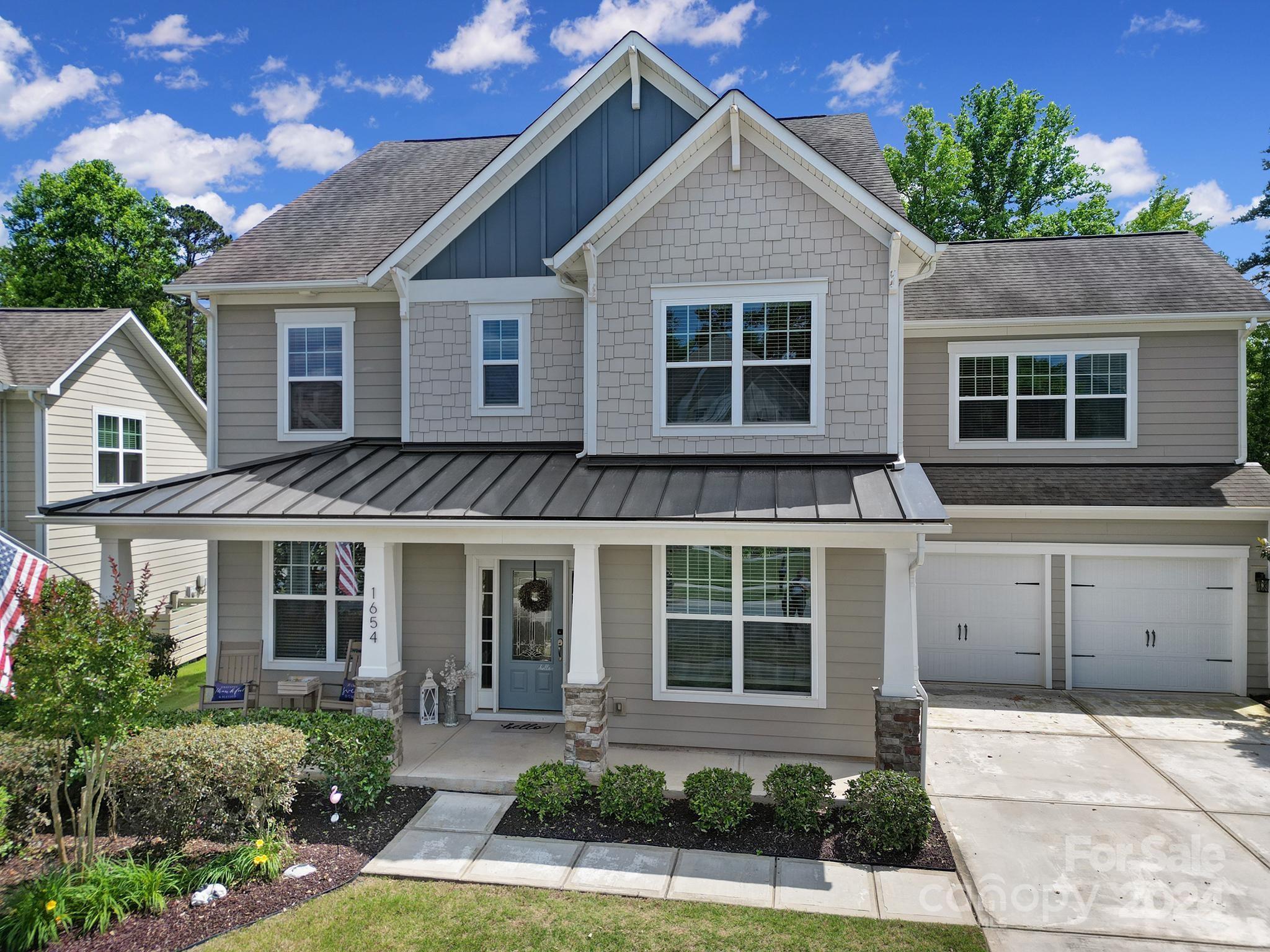 Welcome Home to the Beautiful Springfield Golf Course Neighborhood located in the sought after Fort Mill School District.  This completely updated 5 Bedroom home has it all and beautiful landscaping!  Absolutely stunning and ready for its new owners to move in!  Large backyard provides privacy and mature trees, fully fenced in and a fantastic screen porch to relax and have a cold glass of sweet tea! Modern Farmhouse remodel includes luxury laminate flooring in all rooms and the oak staircase.  Luxury vinyl tile in laundry and bathrooms have been installed. The whole house including garage has been painted and Epoxy garage floor completed.  The beautiful renovation continues with upgraded lighting, fans, and fixtures in every room of this home. Cabinets have been renovated in kitchen and bathrooms and a new kitchen tile backsplash and dishwasher installed.  Complete buyers dream!  Springfield Amenities are exactly what Buyers are dreaming of!