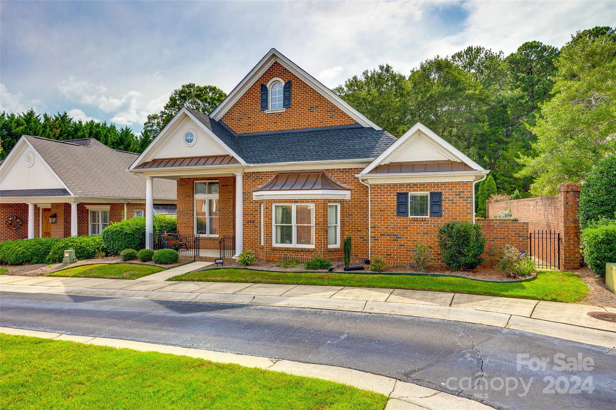 This beautiful, well-maintained, open floor plan home is ready for its new owner!  Enter through the front door, and you will notice 12ft ceilings in most rooms and 10ft in others.  The great light and openness will make you feel right at home!  The living room has a gas fireplace and built-in bookcases and the gourmet kitchen includes granite countertops, cabinets galore and a large pantry.  The primary bedroom boasts a walk-in closet, a linen closet and a bathroom with soaking tub, walk-in shower and a water closet. When you enter through the garage, there is a drop-zone/office area that leads to 2 more bedrooms, a full bath, a half bath and a laundry room with sink.  The most amazing feature of this home is that almost the whole home has entry to the patio and outdoor living area that is fenced in and secluded.  Situated in the amenity-rich neighborhood of Laurel Creek, this home sits centrally in Rock Hill.  Amenities include pool, clubhouse, courts, trails and a playground.