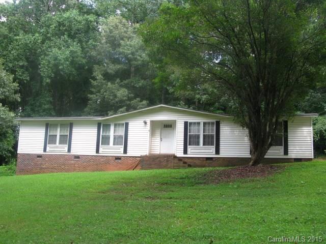 Must see. Huge yard, partial wooded , close to schools, shopping, Davidson college and I-77. Home is great for first time buyer or an investor. Needs some TLC. Ready to move in. This listing consist of 3 lots that add up to 1.53 acres.