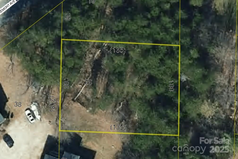 Located just minutes from downtown Morganton and with quick access to I-40, this wonderful level lot offers flexible opportunity for building, including modular homes. Zoned R-1, this lot is one-third of an acre. The adjacnet lot is also available if you're looking for more space.  City of Morganton water availabe with a required tap fee. a septic system is needed.