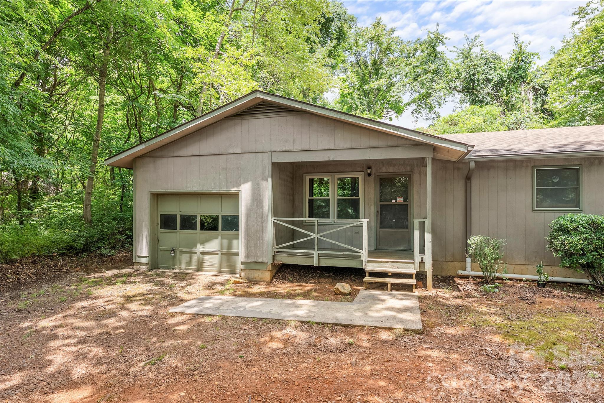 Opportunity awaits in the desirable Grovemont community of Swannanoa! This one level home features 3 bedrooms and 1.5 baths, offering great potential for a first-time homebuyer, investor, or anyone looking to make a home their own. Inside, you will find a fireplace with a wood stove (buyer to determine condition) and well-maintained flooring throughout the main body of the home. The property also includes a single-car garage. Conveniently located near Grovemont Park and the Swannanoa Library, you're just minutes from “downtown” Swannanoa where you can enjoy local coffee shops, restaurants, and the future Beacon Park development. You’ll also be minutes to Historic Black Mountain and an easy 15-minute drive to Asheville.

This property is being sold "As Is" as part of an estate. The seller has not occupied the property and makes no representations regarding the condition of the home. Buyers are encouraged to conduct their own inspections and verify all information important to their purchase.