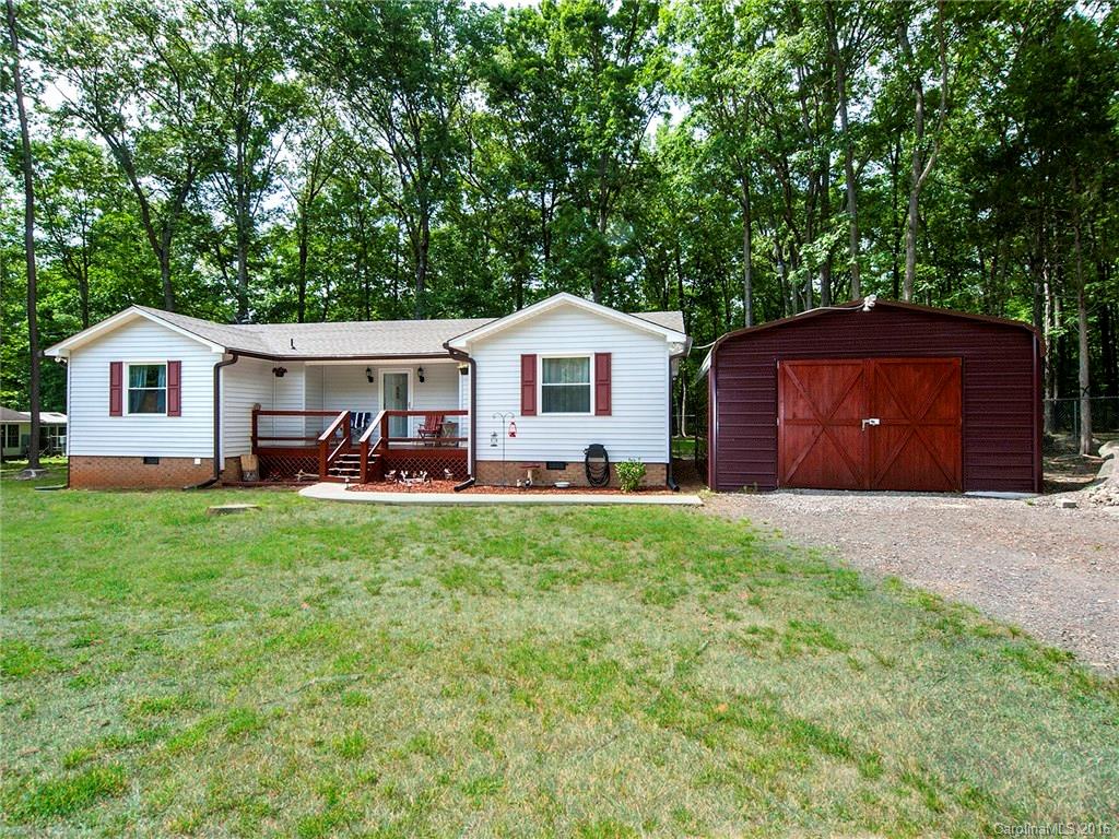 Country living just minutes away from the city. Spend your spare time in peace rocking on your porch. Seller has spent the last five months making upgrades and changes to the property. A solar fan was installed on the roof, plus a new roof, all new windows but three, new well pump and so much more. Don't let this one slip by. Very motivated seller. Bring your offer!