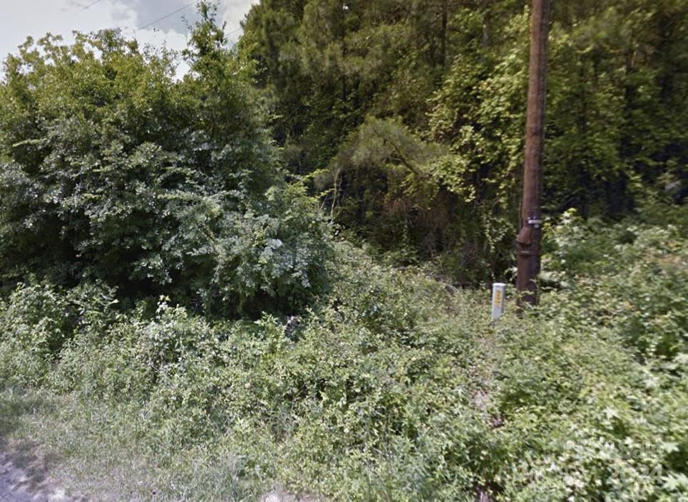 This property is located just minutes away from local shopping centers and other conveniences. There are 10 lots available as part of this listing; each with their own parcel #. All of the lots are wooded lots with the exception of two lots currently having a mobile home on the lots; mobile home will convey with the property. These lots will be  perfect to build a starter home or as an investment opportunity. ..Please inspect this property and validate it for any use that you intend it for prior to writing an offer. Lot has access to city water. Perc test needed.