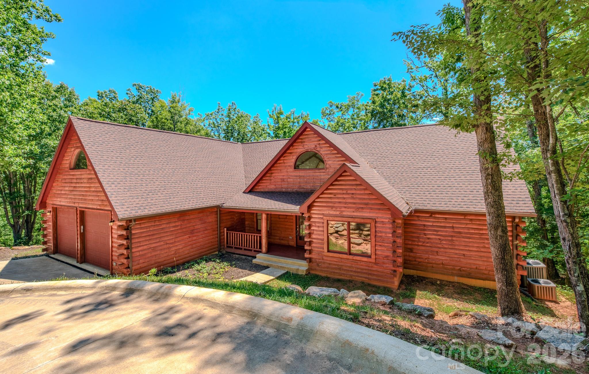 Stunning brand-new log home in the sought-after Rumbling Bald community on Lake Lure! Welcome to 231 Blue Bird Road, where rustic charm meets modern luxury in this never-lived-in custom home. Step inside to soaring 20+ ft cathedral ceilings and a bright, open-concept living space designed for comfort and entertaining. Veneer stone accentuates the electric fireplace in the living room. The gourmet kitchen features custom cabinetry, granite countertops, and a spacious walk-in pantry. The main-level primary suite offers two walk-in closets and a spa-inspired ensuite with a jetted tub, double vanities, and a tiled walk-in shower. With additional bedrooms, a den/study, and multiple bathrooms, there’s room for family and guests alike. The fully finished basement adds exceptional versatility with its own living area, full kitchen, and oversized recreation room—ideal for multigenerational living, guests, or rental potential. Whether you're looking for a full-time residence, mountain retreat, or investment opportunity, this Lake Lure gem delivers space, style, and endless possibilities.Rumbling Bald amenities include: 2 Championship Golf Courses, Wellness Center & Fitness Facilities, Tennis & Pickleball Courts, Private Beach Access (kayak, canoe, SUP rentals), 3 Swimming Pools, Mini Golf, 3 On-Site Restaurants. Visit https://rumblingbald.com/living-here/#section-property-owner-resources.
Notes: Gated community—no drive-bys. Showings by appointment only with a licensed agent.