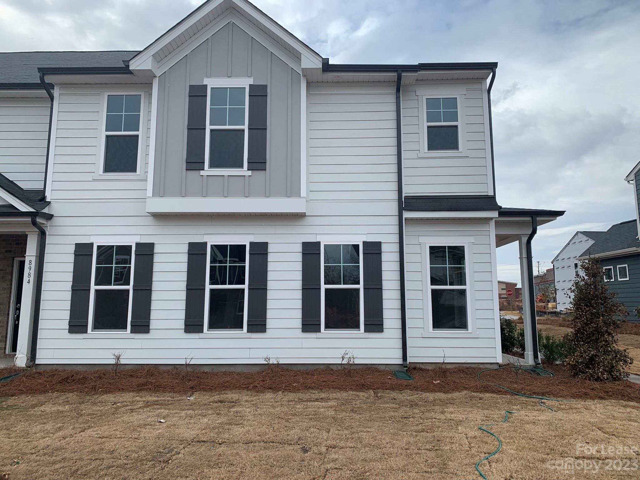 Brand NEW energy-efficient 2-story Townhome located in Odell Corners is Available NOW! Open floor plan with 2-story foyer, wooden rails staircase, family room, oversized chef's kitchen, and 2 car garage on the main floor. Master bedroom with luxurious stand-in shower and HUGE walk-in closet. Two additional bedrooms, a full bath, and a laundry room complete the upper level. Grey Cabinets, quartz countertops, stainless steel appliances, tile backsplash. Community amenities include a playground. Located in a very desirable location, 10 minutes away from all shopping and dining options near Concord Mills Mall, I-85, and I-485. Rent includes WATER, refrigerator, washer, dryer, and HOA fees. Tenants are responsible for electricity. To ensure a smooth leasing process, a credit check, background check, proof of funds, and an application fee are required for tenants aged 18 and over. All pets must be approved by the owner.