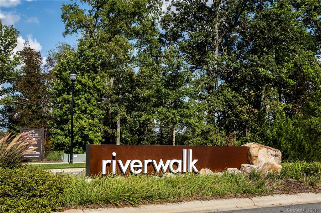 Introducing a meticulously maintained, better than new home in Riverwalk! This sought after model features an open floor-plan, dedicated office space, and the gourmet kitchen you've dreamed of! The gas cook-top, stainless steel appliance and large island makes this townhouse a showpiece! The hardw floors are stunning, & run through the main level. Enjoy dinner with a view, one the oversized deck! Talk a super-quick walk to the Catawba River, Y, velodrome, the Vine & The Pump House.  WOW Factor!