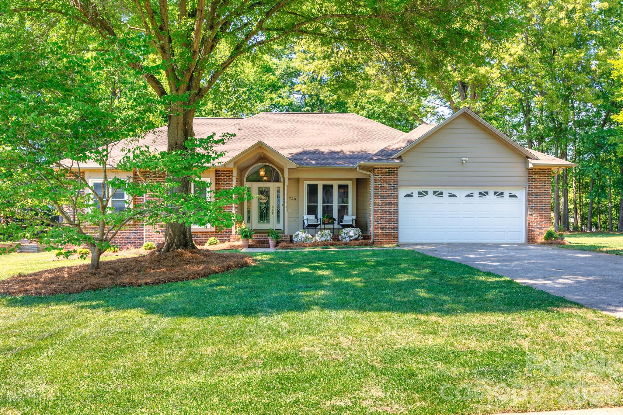 ONE LEVEL | NO HOA | TIMBERLAKE – BELMONT

Beautifully maintained one-level home in the highly desirable Timberlake community—offering the rare combination of NO HOA and a prime Belmont location! This property sits on a large, level lot with a fenced backyard and inviting outdoor living spaces, including a spacious grilling deck and fire pit area—perfect for relaxing or entertaining.

A standout feature is the all-season sunroom with its own mini-split system (not included in heated square footage), creating a versatile space for dining, lounging, or exercise year-round.

Inside, you’ll find stunning hardwood floors throughout—no carpet—and a comfortable, functional layout. The front office/flex space (no closet) provides options for work or guests. The kitchen is well-appointed with granite countertops, abundant cabinetry, a prep island, and a gas range—ideal for everyday living.

The spa-like primary en-suite offers a spacious bedroom filled with natural light, a walk-in closet, double vanities, and a separate, large walk-in shower - creating a relaxing retreat.

Thoughtful updates include roof, whole-house generator,  GSM wireless-controlled crawlspace system, well cared for HVAC (Duke recognized home as above average in energy savings and efficiency) reflecting true pride of ownership.

Additional highlights include an attached two-car garage, ample driveway parking, and a welcoming covered front porch. Conveniently located just minutes from downtown Belmont, parks, schools, and scenic walking and biking trails.