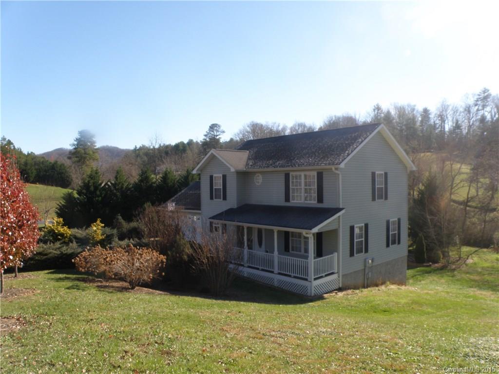 Move In Ready home in desirable Weaverville subdivision, immaculate condition, private, many trees on property,creek/stream,  tons of natural sunlight. quiet neighborhood, convenient to Weaverville & Asheville, backyard & covered deck-perfect for entertaining or enjoying the outdoors, family room/den in bsmt, storage, 2-car attached garage,  outbuilding, hardwood, ceramic tile & carpet floors.