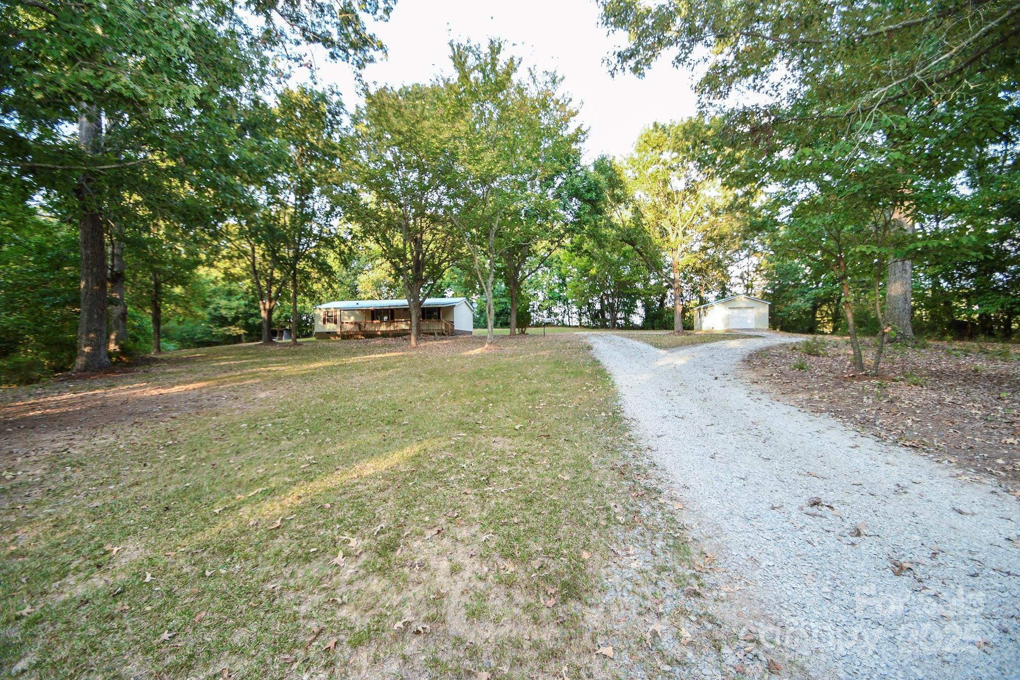 **Charming Home in Highly Desired Piedmont Schools District**

Discover your dream retreat in this beautifully updated 3-bedroom, 2-bath home nestled on a private 2-acre wooded lot. Enjoy the perfect blend of tranquility and modern living with a host of new features, including a new roof, stylish LVP flooring, plush new carpeting, and fresh paint throughout. 

The heart of the home boasts a stunning master bathroom remodel, complete with a new countertop, vanity, shower, and plumbing fixtures. Natural light floods the spacious living areas, complemented by new light fixtures that enhance the home's welcoming atmosphere.

Step outside to your private oasis, where you can unwind or tackle projects in the 24' x 16' wired workshop, perfect for hobbies, or use it as a garage or just extra storage. 

Don’t miss your chance to make this stunning house your new home!