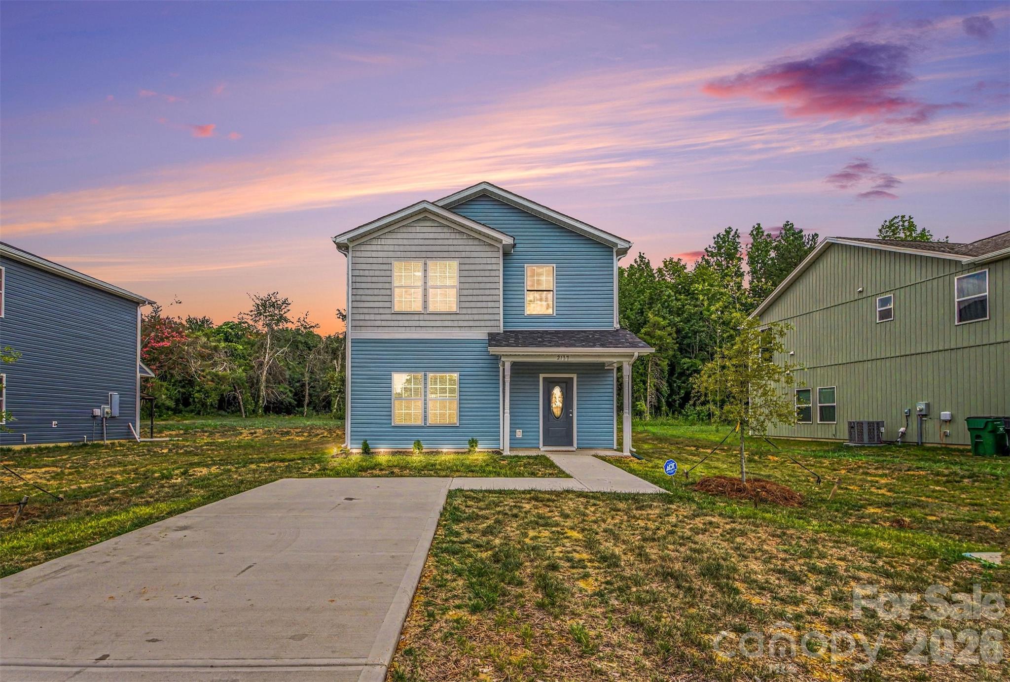 Welcome to 2137 Tom Sadler Rd, where modern design meets comfort, convenience, and the freedom of NO HOA. Situated on a large, level lot with plenty of room to add a fence, garden, or outdoor living space, this move-in ready home offers the perfect blend of style and functionality.
Inside, you'll find luxury vinyl plank flooring throughout the main level, an open-concept floor plan, and abundant natural light. The kitchen is beautifully appointed with granite countertops, stainless steel appliances, soft-close cabinetry, and a large center island that's perfect for everyday living and entertaining. Just off the kitchen is a spacious laundry room complete with washer and dryer hookups, shelving, and additional electrical outlets for added convenience.

Upstairs, the generous primary suite features a walk-in closet and an ensuite bathroom. Two additional bedrooms, a full bathroom, and a linen closet complete the second level, offering a total of 3 bedrooms and 2.5 bathrooms. The carpet has been professionally cleaned, making the home truly move-in ready.
Built with modern materials, attractive lighting fixtures, and energy-efficient systems, this home offers the benefits of newer construction without the wait.

Conveniently located approximately 10 minutes from Charlotte Douglas International Airport, 15 minutes from Uptown Charlotte, and just minutes from major highways, shopping, dining, and everyday conveniences, this home offers an exceptional combination of location and value.
Schedule your private tour today!