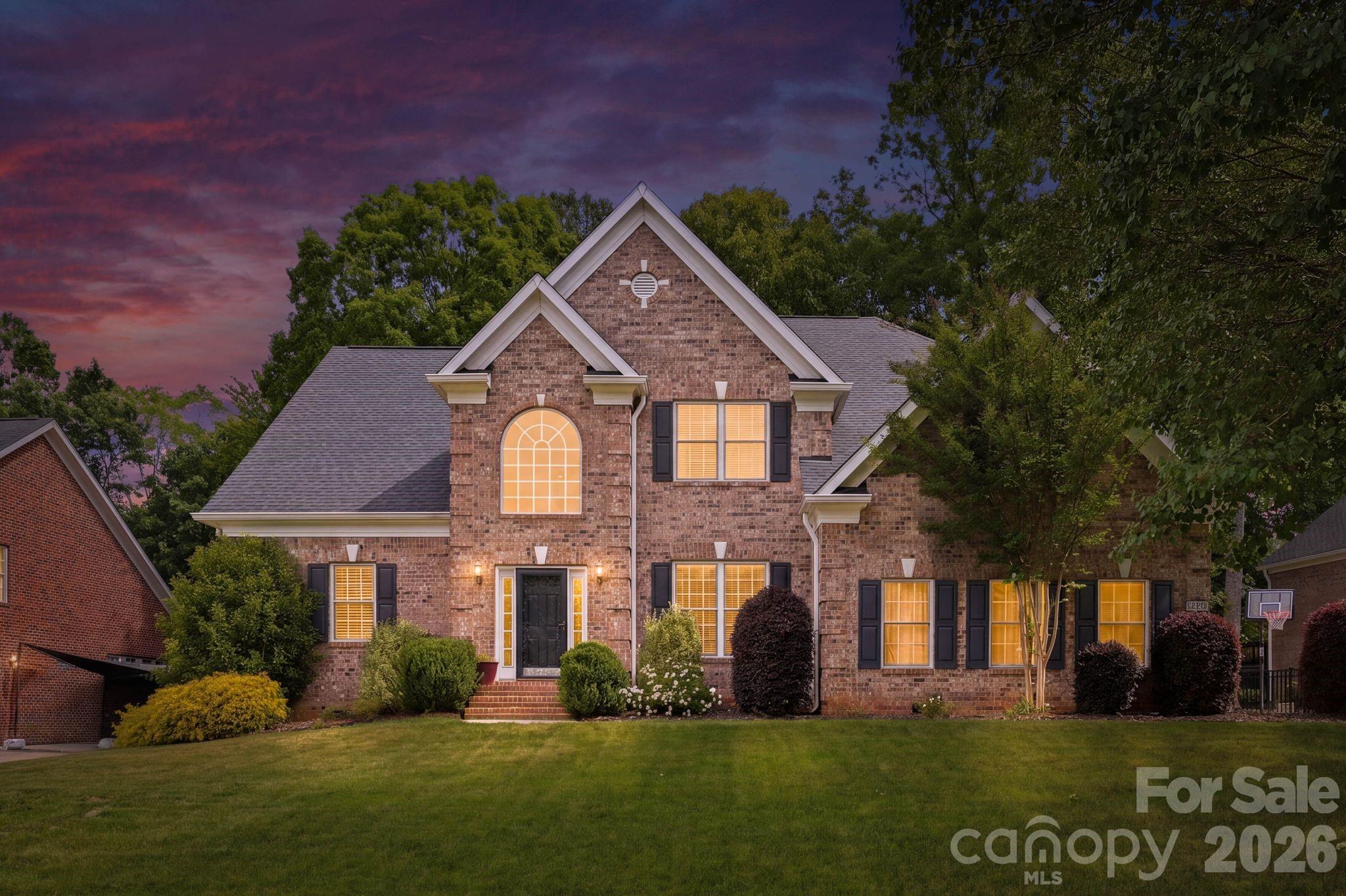 Welcome to 10508 Devonshire Drive — a rare opportunity in the highly sought-after Enclave section of Birkdale, where full brick homes, side-load garages, and larger homesites create one of the community’s most desirable streetscapes. Perfectly positioned on the 4th hole of Birkdale Golf Course, this beautifully maintained home offers over 4,300 square feet with 5 bedrooms, 3.5 baths, a dedicated main-level office and a highly desirable primary suite on the main floor. Designed for both everyday living and entertaining, the open floor plan is filled with natural light and features hardwood floors, a soaring two-story great room, and picturesque golf course views. The updated kitchen serves as the heart of the home with a large island, granite countertops, white cabinetry, stainless steel appliances, walk-in pantry, breakfast area, and beverage/wine refrigeration. The spacious main-level primary suite and dedicated office provide ideal functionality for everyday living, while upstairs includes four additional bedrooms, two full baths, and a versatile bonus room. Step outside to enjoy the fenced backyard overlooking the golf course, complete with a fire pit and inviting spaces for entertaining or relaxing year-round. Located just moments from Birkdale Village, Lake Norman, Blythe Landing, dining, shopping, and an easy commute to Uptown Charlotte, this home offers an exceptional blend of golf course living, timeless design, and one of Huntersville’s most sought-after locations.