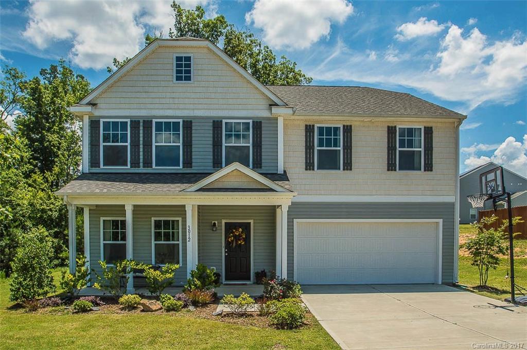 Location is everything in Charlotte and we have it! This four bedroom home features a massive loft perfect for the largest of TVs and a huge master bedroom with lots of walk in closet space. The open floor plan is perfect for entertaining as the huge family room flows directly into the kitchen. This homes best feature is the privacy. With no neighbors behind you or to one side of you, this corner lot has mature trees to the rear and the side giving you a peaceful solitude for your enjoyment.