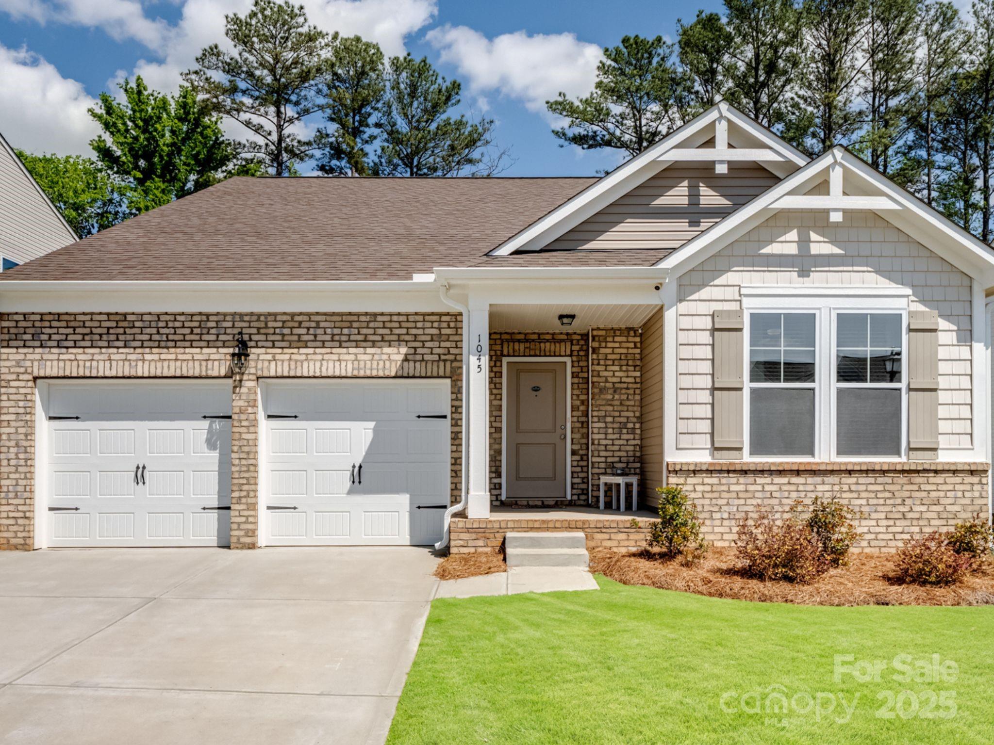 Built in late 2023, this beautiful home is a must see with 4 bedrooms and 3.5 bathrooms.  The main floor includes 2 bedrooms - a guest bedroom and the primary bedroom.  Guest bedroom #1 on the main floor is next to a full bathroom - perfect for the guest or family member who cannot navigate the stairs.  The primary bedroom has an en-suite bathroom with a large soaking tub, glass enclosed shower and 2 walk-in closets.  Main floor also includes a bonus/flex room with doors and could be utilized as a home office, formal dining room, etc.  The living room and kitchen feature an open floor plan with a large island, walk-in pantry and breakfast area.    There is another half bathroom off the kitchen.  Upstairs features 2 more bedrooms and a full bathroom.  There is additional attic storage. Enjoy evenings on the screened-in patio off the kitchen/breakfast area.  The driveway has an expanded concrete pad with an additional parking space.