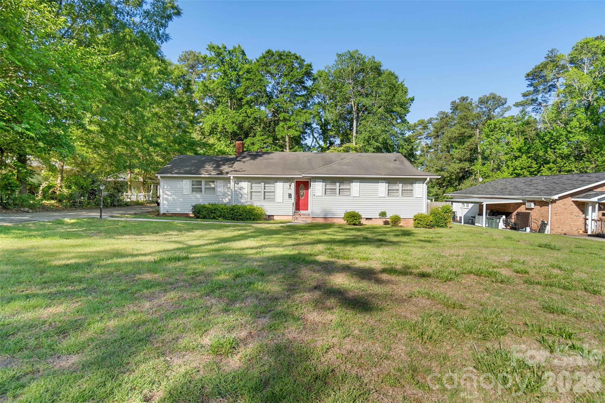 This home is ready for you to move in and make it your own. 3-bedroom, 1-bath home situated on a spacious 0.45-acre lot with a large backyard perfect for outdoor living and entertaining. The home features newer laminate flooring throughout most of the interior, a possible formal living room or den, dining area, and a large family room complete with built-in desk and bookshelves. Appliances are included for added convenience. Enjoy relaxing in the private screened-in back porch or entertaining on the deck designed for complete outdoor enjoyment. A detached 1-car garage provides extra storage and parking space, with the back section previously used as a workshop. Conveniently located close to restaurants, shopping, and with easy access to two highways for commuting and travel. This home offers a wonderful combination of comfort, functionality, and outdoor charm!