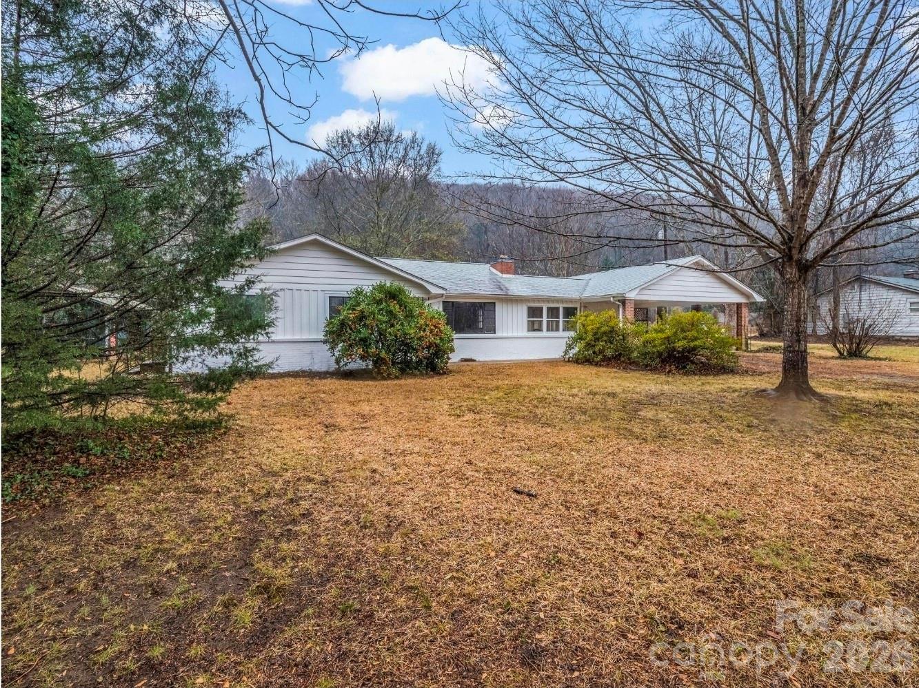 Discover the magic of RIVERFRONT living at 109 Wall Road—your cozy, cottage perched along the beautiful North Pacolet RIVER. Tucked just outside Tryon city limits, this home gives you the best of both worlds: peaceful privacy, lower taxes, and that “away from it all” feeling… all while being MINUTES from town, shopping, dining, equestrian attractions, and the conveniences of both Western North Carolina and Upstate SC!

The real showstopper is out back!!!! Prop your feet up on the lawn, sip your morning coffee, and let the soothing sound of the North Pacolet River wash over you. Whether you’re unwinding after a long day, hosting friends, or simply taking a breath, this yard is the kind of quiet sanctuary buyers search everywhere to find. It’s the lifestyle people dream about—but rarely get to enjoy daily. Step inside this charming ~1200 sq ft cottage (+ Non-HLA is the sunroom with 150+ sq ft; you can utilize!!!) and feel instantly welcomed. The layout offers comfortable living spaces, warm natural light, and the kind of character you just can’t replicate. 

The location couldn’t be more ideal. You’re just moments to downtown Tryon’s charming shops and restaurants, and minutes to all the amenities of Columbus, Landrum, and the entire Upstate SC corridor. Tryon International Equestrian Center, endless hiking, boutique wineries, farm-to-table dining, arts, live music, equestrian events, and mountain adventures are all within easy reach. Asheville, Greenville, Spartanburg, Lake Lure, and the Blue Ridge Parkway are comfortable day trips, giving you access to every corner of WNC and the Upstate.

If you’ve been searching for a full-time residence, mountain getaway, or easy investment in a growing area, this is one you don’t want to let slip by. The combination of location, riverfront serenity, and Tryon’s vibrant lifestyle make 109 Wall Road a standout opportunity.

Come experience it for yourself—you’ll understand the moment you hear the river!

This home also offers peace of mind. A previous appraisal—completed over a year ago—came in at $250,000. Property located in a FEMA-designated Special Flood Hazard Area, although the property has no known damage from the 2024 hurricane
. 
****Homes like this—RIVERFRONT, close to town, maintained through the years, and with this kind of charm—simply don’t come around often!!!!****
