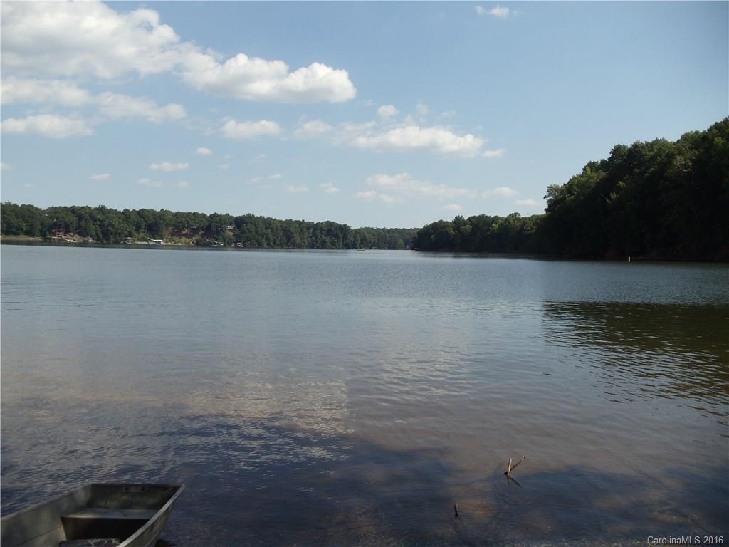 This is a beautiful waterfront property.  In all it has 1.42 acres, lots of room to grow and make this place your own.  Lots of trees for privacy, make this stretch of Lake Wylie yours.  Call today to see.