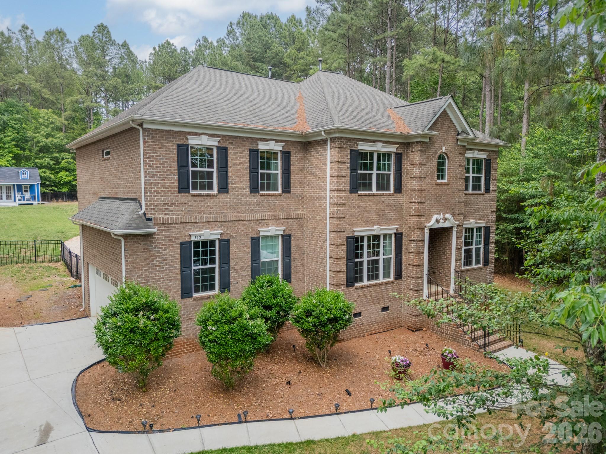 Welcome to your own private Lake Norman retreat in beautiful Troutman, NC! Sitting on over an acre with lake views, this 5 bedroom, 4.5 bath home brings together luxury, space, and the kind of backyard made for peace & relaxation. With over 3,400 square feet, there’s room for everyone to spread out while still feeling warm and inviting. Inside you’ll find an open concept living room with fireplace, beautiful kitchen with island and breakfast area, half bath, private dining room, and formal living/office/or playroom area. Also on the main level, a private guest/in-law suite with full bath. Upstairs you will find a loft area currently serving as a home theater, a spacious primary suite with ensuite bath, dual vanities, and an oversized closet. Each bedroom thoughtfully laid out, bedrooms 3 & 4 with Jack and Jill bath and bedroom 5 with its own dedicated bathroom. The heated saltwater pool, hot tub, oversized patio, mature trees, and the sound of nature create the ultimate backyard oasis with serious staycation vibes... you will never want to leave! There are also friendly deer that make a visit! Whole home generator incase power goes out that instantly switches over. There’s also a spacious two-car garage, oversized driveway with plenty of parking, and a detached tiny home/storage building with endless possibilities. 
If you’ve been searching for a lifestyle like this in Lake Norman, this Troutman gem checks all the boxes. Schedule your showing today, homes like this don't last long.