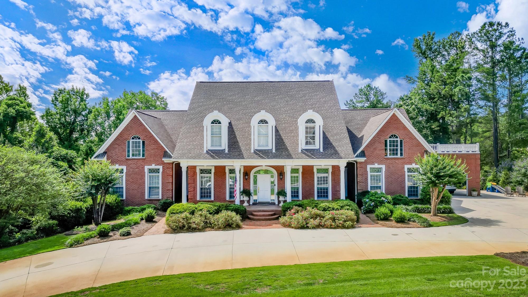 Incredible custom home on double lot overlooking a pond. Privacy is offered by surrounding trees & landscaping. 1st floor has ample space & is perfect for entertaining. Drop zone w/ 6 cubbies, oversized laundry w/ sink & folding/hanging area. Keeping room, great room, balcony, open kitchen concept, office & huge butlers pantry/bar area. Primary BR completes the first floor & has a walk in closet, custom dressing room (could make a great home office or nursery attached to primary br) & a spacious bath with sauna. Upstairs the BRs are huge & all feature walk in closets & private baths. Basement is a playground for all ages & walks out to a covered porch & beautiful yard. There is no shortage of storage in this home! This house has been well cared for & kept in the family. Laurel Creek neighborhood is one of Rock Hill's most desired communities. Tennis courts, miles of shaded walking trails & an incredible pool with a water slide. Only a few miles from I-77, this location cant be beat!