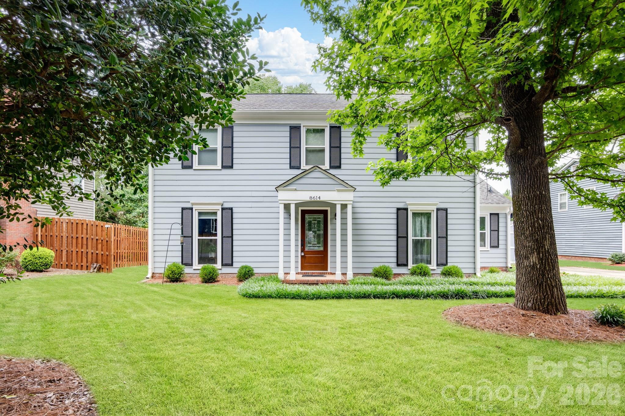 Welcome home to 8614 Ducksbill Drive, a beautiful 3-bedroom, 2.5-bathroom residence perfectly situated in the highly desirable South Charlotte Raeburn neighborhood. This home features hardwood floors that flow seamlessly throughout the entire layout, creating an inviting and cohesive atmosphere. At the heart of the home is a beautifully appointed kitchen boasting rich granite countertops, while the updated bathrooms offer a touch of luxury with new marble-top vanities and custom tile work. Windows and Doors were replaced in 2020.  Outside, a matching storage shed conveys with the property, providing excellent convenience and extra space. Located just minutes from premier shopping, dining, and top-rated schools, the property is nestled within a fantastic neighborhood featuring an exceptional amenity package that includes a community pool, tennis and pickleball courts, a recreation field, a playground and more!