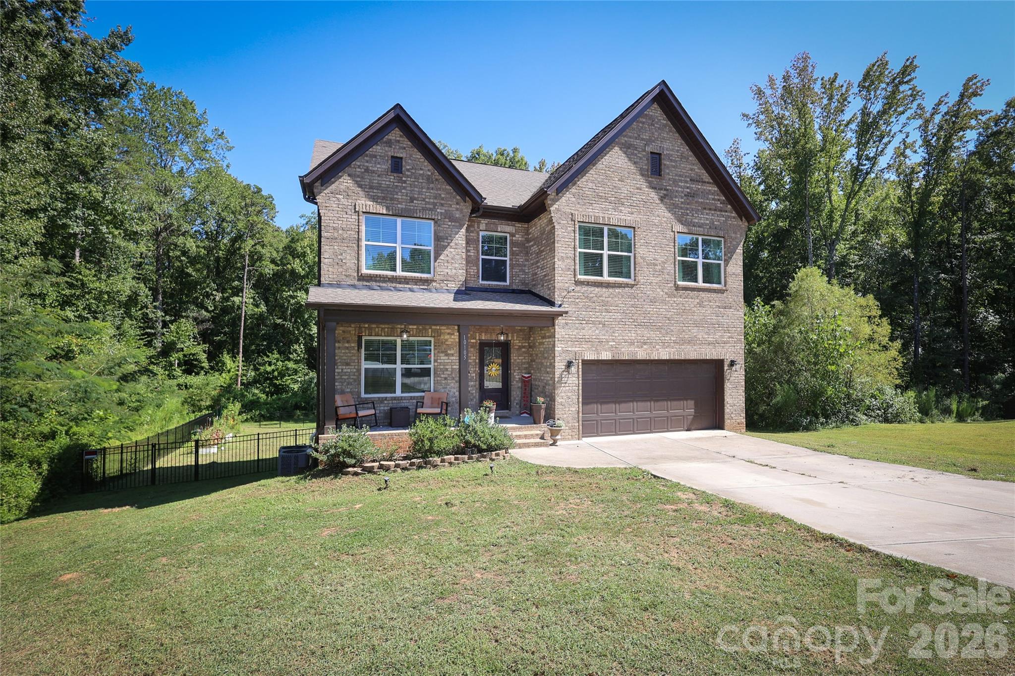 Welcome to 10105 Greenwood Court, a beautiful 2021-built home tucked away on a private cul-de-sac lot with no HOA and peaceful pond views. Conveniently located near Concord and Charlotte, this home offers modern living with plenty of space inside and out.

The open floor plan features a stylish kitchen with granite countertops, a large island, and butler’s pantry flowing into the main living and dining areas. Upstairs, the spacious primary suite is joined by three additional bedrooms, upstairs laundry, and a versatile bonus/media/office room.

The finished basement provides even more flexible living space with plumbing already in place for a future bathroom. Outside, enjoy nearly an acre with a level yard, pond views, and a two-car garage. A great combination of privacy, space, and convenience in a highly desirable location.