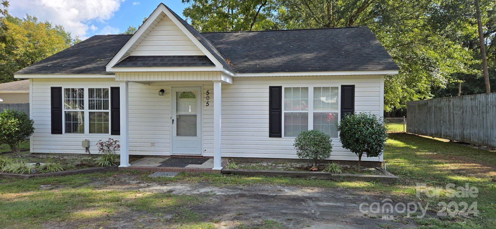 Great Home for the 1st Time Buyer - Located in the quaint town of Pageland. The Home features a spacious Living room with vinyl plank floors (wood grain finish), an open Kitchen with plenty of cabinets, ceramic tile floors, microwave, dishwasher and refrigerator. The back yard is private and fenced - perfect for entertaining.