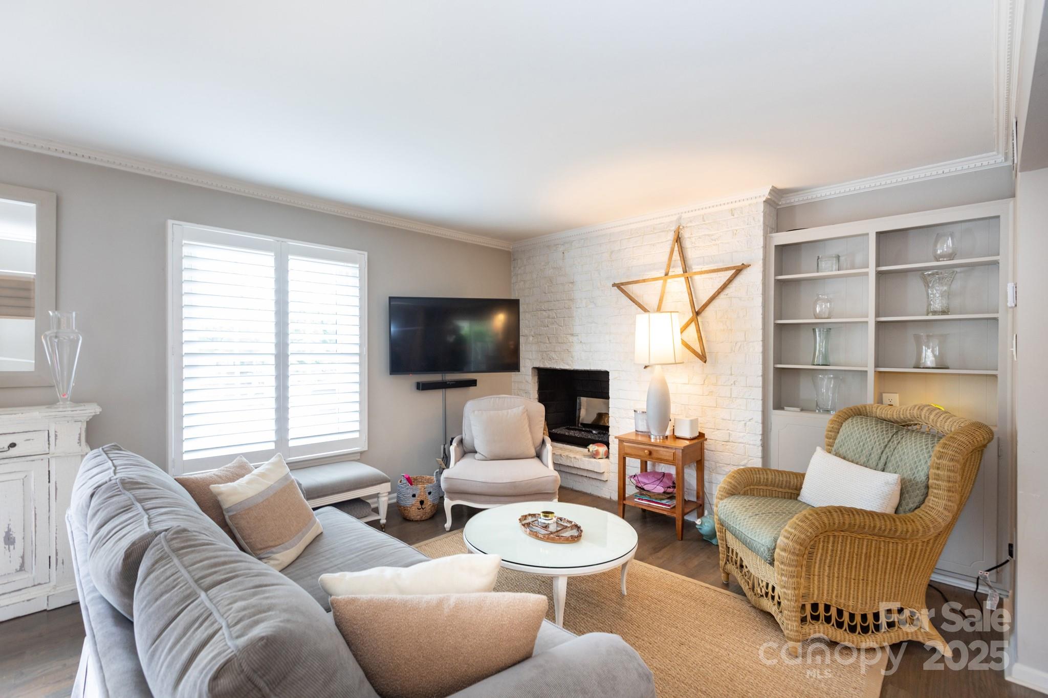 Welcome to your South Park retreat! This beautifully updated two-bedroom, two-and-a-half-bath townhome in the ideally located Trianon Condominium complex offers the perfect blend of comfort and convenience. Just two blocks from South Park’s finest shops, restaurants, bars,grocery stores, art galleries, bakeries, etc., this location truly has it all. Step inside to discover a contemporary open floor plan on the main level, featuring stunning hardwood floors and a thoughtfully renovated kitchen that’s perfect for entertaining. The living room boasts a cozy gas fireplace, creating a warm and inviting atmosphere. Upstairs, you’ll find spacious bedrooms with private baths, offering both style and functionality. Enjoy outdoor living on your fenced-in patio—a serene spot for morning coffee or evening gatherings. With modern updates, prime South Park location, and a community that blends convenience with charm, this townhome is an opportunity to experience Charlotte living at its best.