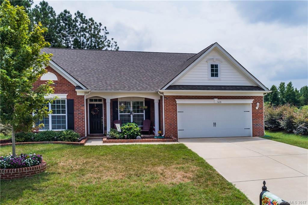 This beautiful all brick 3 bedroom/2bathroom ranch WILL NOT LAST LONG. It has a gorgeous open kitchen, vaulted ceilings, fireplace, and screened porch. Kitchen has granite countertops, stainless appliances, and 42" cabinets! This home is on a corner lot with common space next to it!