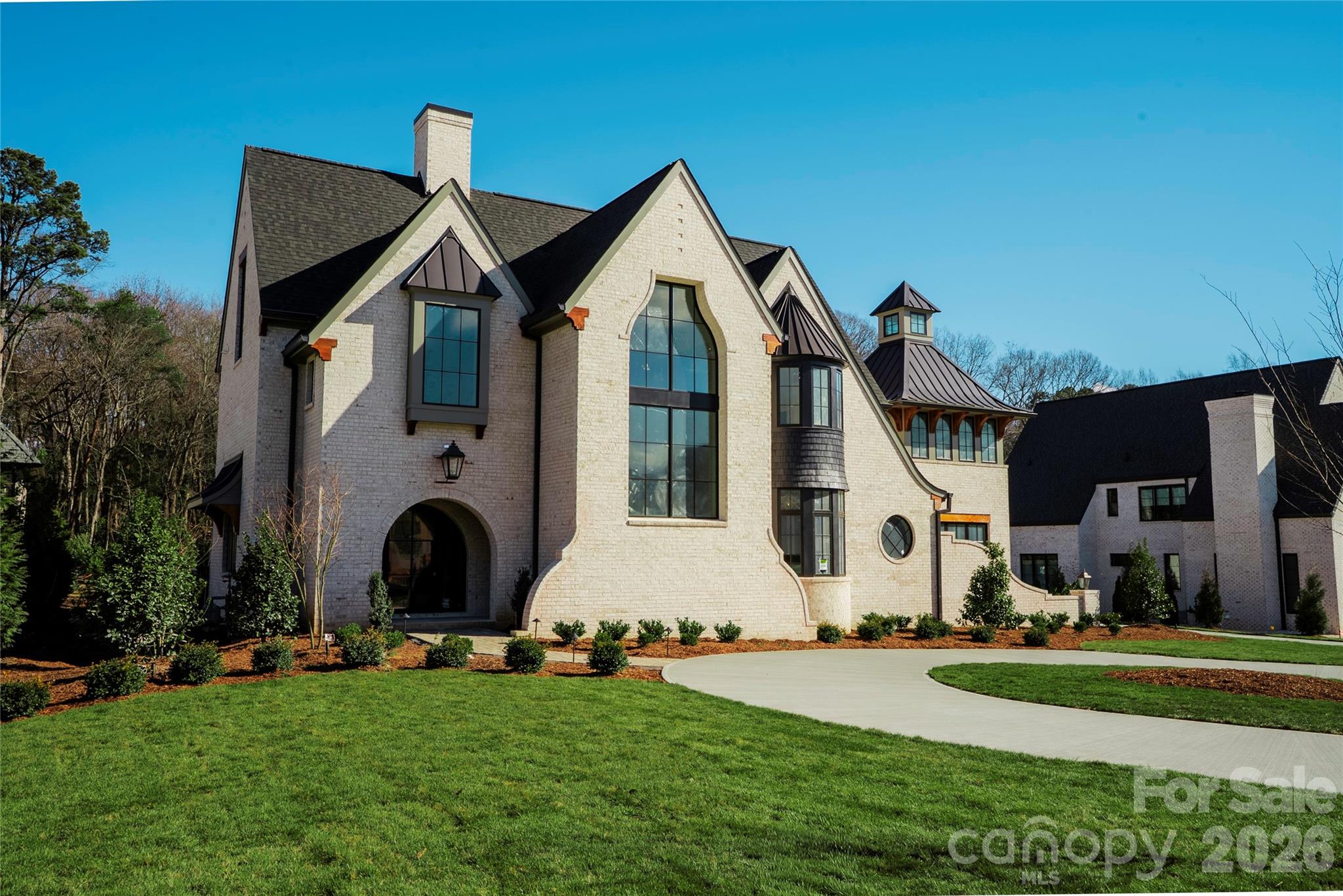 Land and custom build package listed for comp purposes. The Manors at Mattie Rose is an exclusive gated community that spans across 9 acres off Alexander Road in South Charlotte. Eight estate homesites measure around 1-acre each, creating a picturesque retreat just minutes from the excitement of the city. Design your custom home alongside Grandfather Homes and their team of local architects, designers and craftsman. Schedule your personalized design consultation today to start your dream home.