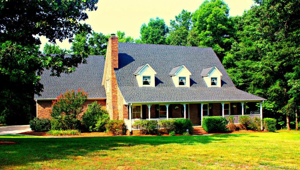 Live among mature trees & landscaping while enjoying your 3-level deck, hot tub, and inground pool. Fenced yard is built for entertaining & with natural areas giving privacy only 3 miles from shopping/dining. Full brick home features a wrap around front porch. Inside,are 2 master suites, 1 above garage & 1 on main floor. Hardwoods in the living areas on the first floor & drop zone make this home easy to maintain. Another bedroom down & 2 more up, PLUS a bonus are just some of the great features.