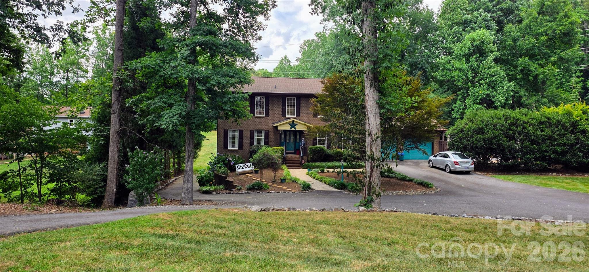 Welcome to this beautiful 4-bedroom, 5-bath brick home on nearly one acre in a quiet, established neighborhood with no HOA. Offering an exceptional combination of space, comfort, and outdoor living, this property is designed for both everyday enjoyment and entertaining.

From the charming front porch to the spacious interior, you'll immediately appreciate the warmth and character this home has to offer. The thoughtfully designed floor plan provides ample living space, while large windows fill the home with natural light. A bright and inviting sunroom offers the perfect place to enjoy your morning coffee, unwind with a good book, or take in views of the backyard year-round.

The finished basement adds incredible flexibility and could easily serve as a private apartment, guest suite, multigenerational living space, recreation area, or additional entertainment space. With its versatility and generous square footage, the possibilities are endless.

Step outside and discover your own private backyard retreat. The inground pool creates the perfect setting for summer fun, while the large covered deck overlooking the pool provides an ideal space for grilling, dining, and gathering with family and friends. The expansive lot offers room to spread out and enjoy outdoor activities, gardening, pets, or future improvements. A charming outbuilding adds extra storage space and character to the property.

Additional features include a spacious 2-car garage, ample parking, and the low-maintenance appeal of a classic brick exterior. The combination of indoor living space, outdoor amenities, and the peaceful neighborhood setting makes this property a rare find.

If you've been searching for a home that offers room to grow, exceptional entertaining space, and endless possibilities, this property deserves a place at the top of your list. From the finished basement and sunroom to the pool, covered deck, and nearly one-acre lot, this home truly has something for everyone.

*The pool has been winterized, however pictures from the pool in use last year were included*