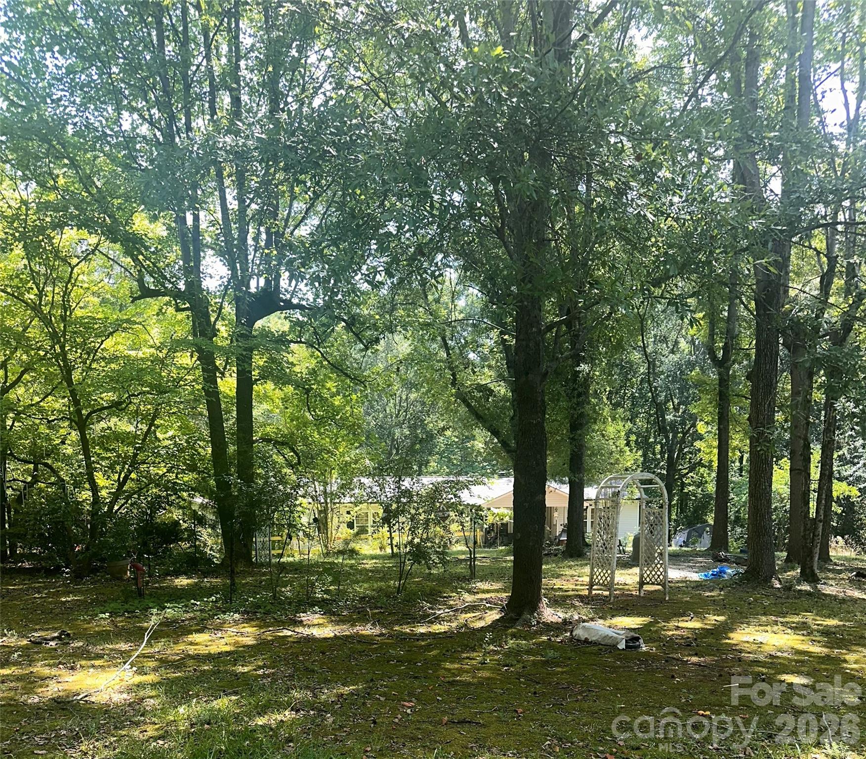 Opportunity awaits! Nestled on a peaceful wooded cul-de-sac lot, this 3-bedroom, 2-bath manufactured home with covered porch offers endless potential for investors, renovators, or buyers looking for a property with room to make it their own. The property includes a stream in the back of the property, three storage sheds and a wired building, providing ample space for hobbies, equipment, or workshop needs.
Whether you choose to renovate the existing home or explore the possibilities the lot has to offer, this property presents a great opportunity. 
USDA financing is eligible for qualified buyers.

Property is being sold "as is"  and home needs TLC.
Professional photography and floor measurements will be completed and added as soon as they're available. Stay tuned for additional information.