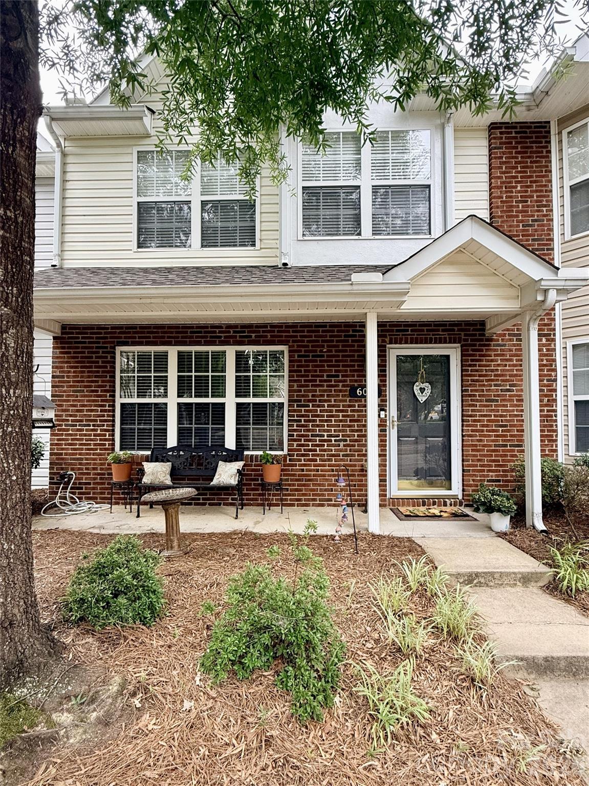 Welcome to 605 Gelderland Dr—a meticulously maintained, move-in-ready townhome offering comfort, convenience, and stylish updates in a highly desirable location. Nestled within the established Arlington Downs community, this charming residence combines low-maintenance living with functional spaces designed for today's lifestyle.

Step inside to discover new luxury vinyl plank flooring throughout the main level, creating a fresh, modern feel while providing durability and easy maintenance. The floor plan offers seamless flow between the living room, dining area, and island kitchen, making everyday living and entertaining effortless. The kitchen features ample cabinet and counter space, a center island perfect for meal prep or casual dining, and a complete appliance package that conveys with the home. Ceiling fans throughout enhance year-round comfort and energy efficiency.

The welcoming covered front porch provides the perfect spot to enjoy your morning coffee, while the rear patio offers a peaceful outdoor retreat overlooking open green space. Whether relaxing after a long day or hosting guests, this private setting extends your living area outdoors and provides a tranquil backdrop rarely found in townhome communities.

Upstairs, the thoughtfully designed layout offers comfortable bedrooms with generous closet space and well-appointed bathrooms. The home's clean condition and careful maintenance are evident throughout, allowing buyers to move in with confidence and immediately enjoy all the property has to offer.

Located in Union County with convenient access to Matthews, Stallings, Indian Trail, I-485, and Highway 74, this home places shopping, dining, parks, recreation, healthcare facilities, and commuter routes within easy reach. Community amenities include sidewalks, green spaces, and recreational opportunities that contribute to an enjoyable lifestyle. As an added bonus, buyers can receive a 1.5% closing cost credit when using the preferred lender.
*Professional pictures and measurements to be uploaded on 6/26/26.*