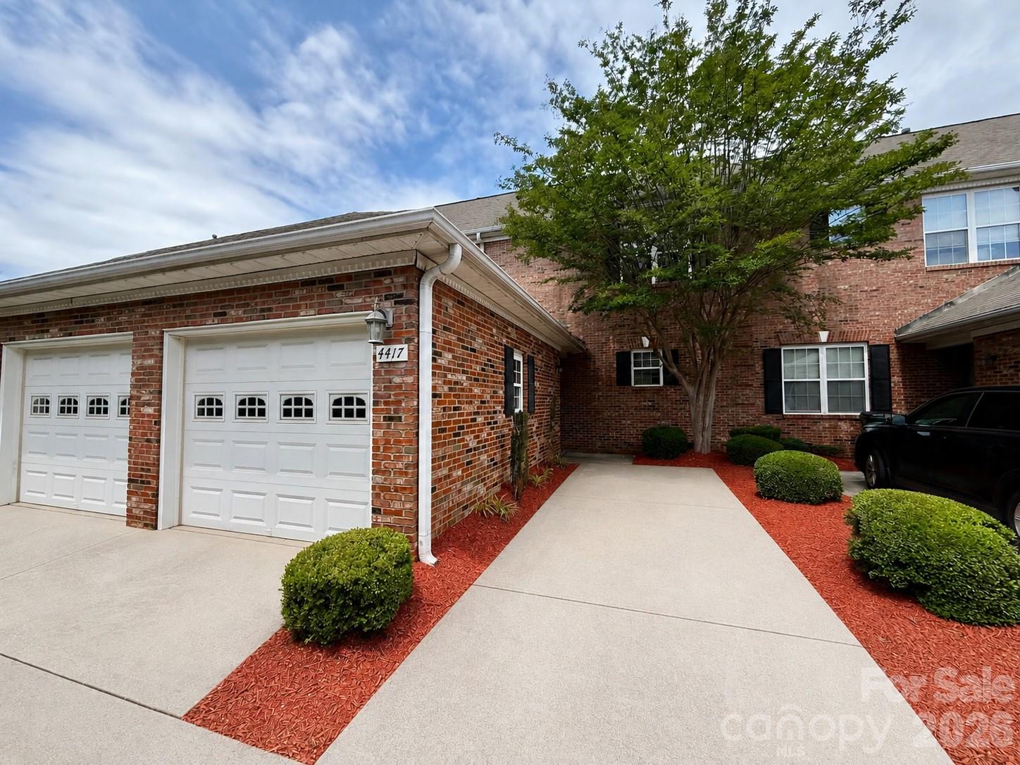 Welcome home to this beautifully updated townhome in the highly desirable Steele Creek area of Charlotte. Offering the perfect blend of comfort, style, and convenience, this  home features an open-concept layout ideal for both everyday living and entertaining. Recent upgrades provide peace of mind and modern appeal, including all-new flooring installed in April 2024, freshly painted kitchen cabinets, brand new hardwood stairs, and new carpet throughout the upper level. The kitchen is further elevated with an upgraded Samsung Bespoke refrigerator, adding both functionality and contemporary design. The spacious main living area features abundant natural light, a welcoming flow, and timeless finishes throughout. Upstairs, both bedrooms offer privacy and comfort with refreshed flooring and updated touches. Major mechanical updates include a new HVAC system installed in December 2021 and a new hot water heater installed in September 2023, making this home as practical as it is.