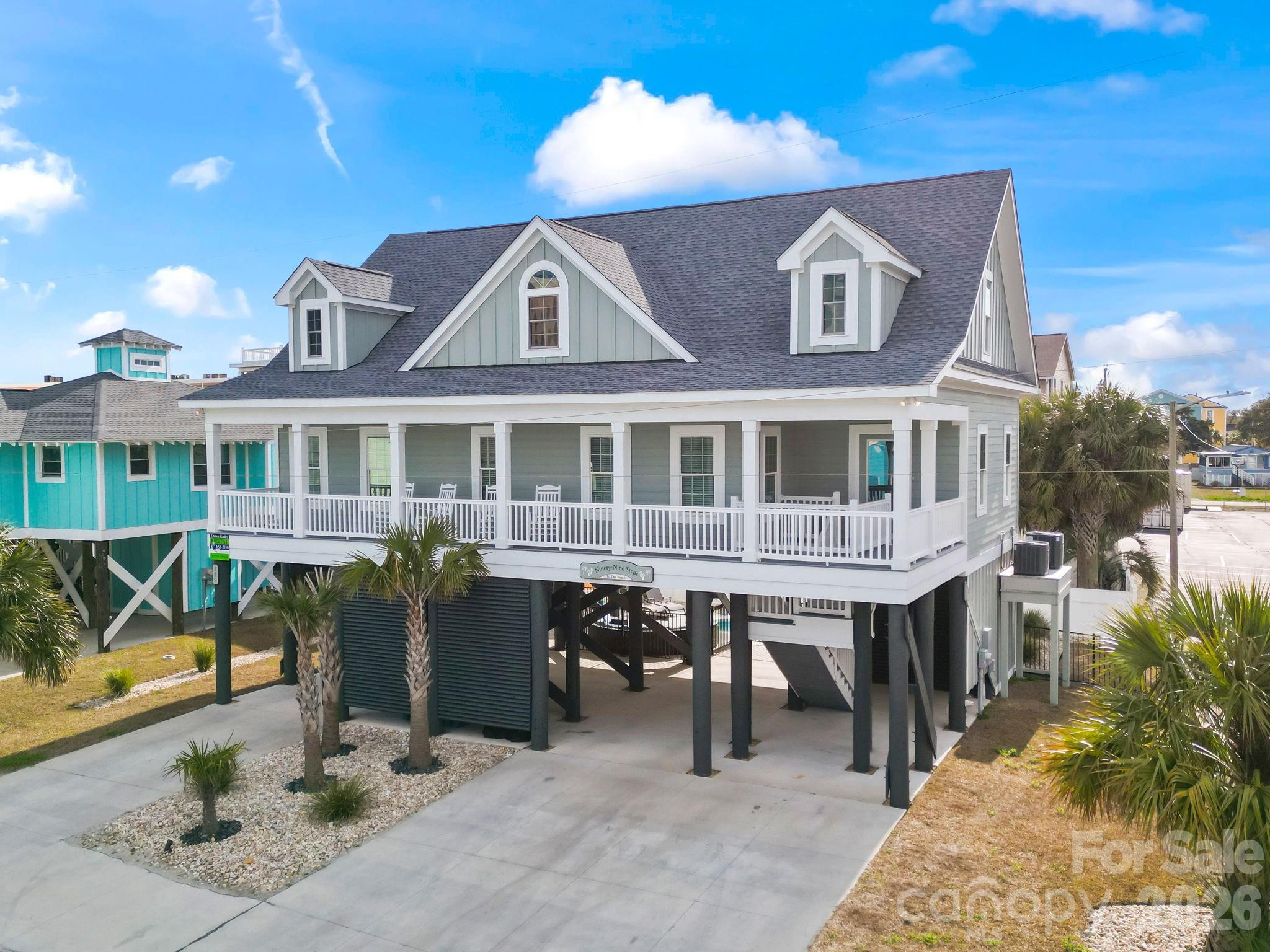 Whether you are looking for a turnkey investment property or a home away from home, this is your opportunity. This is a stand alone custom built home that comes tastefully decorated and fully furnished for all your needs. NO HOA or land lease!  Currently used as a vacation rental but it could be your second home as well! Built in 2023, it has the perfect modern layout to accomodate up to 16 guests. On the main level you will find 1 primary bedroom with private en suite, 2 additional bedrooms with a shared hall bath, laundry closet and kitchen, living and dining area. Upstairs is properly situated with another primary bedroom with private en suite, another hall full bath, loft area for the guests to hang out, and to finish up another bedroom with 2 bunkbeds for the kiddos. This is an ideal layout for a multi-family vacation. The front covered porch has a perfect unobstructed view of the ocean! Just "99 STEPS" to the sandy beach of Garden City. The outdoor area has tons of parking, covered space for hanging out, and a private in-ground pool. This location is ideal within steps to the ocean, walking distance to the Garden City pier, arcade, and the famous Sam's Corner! Come check this one out while you still have the chance!
