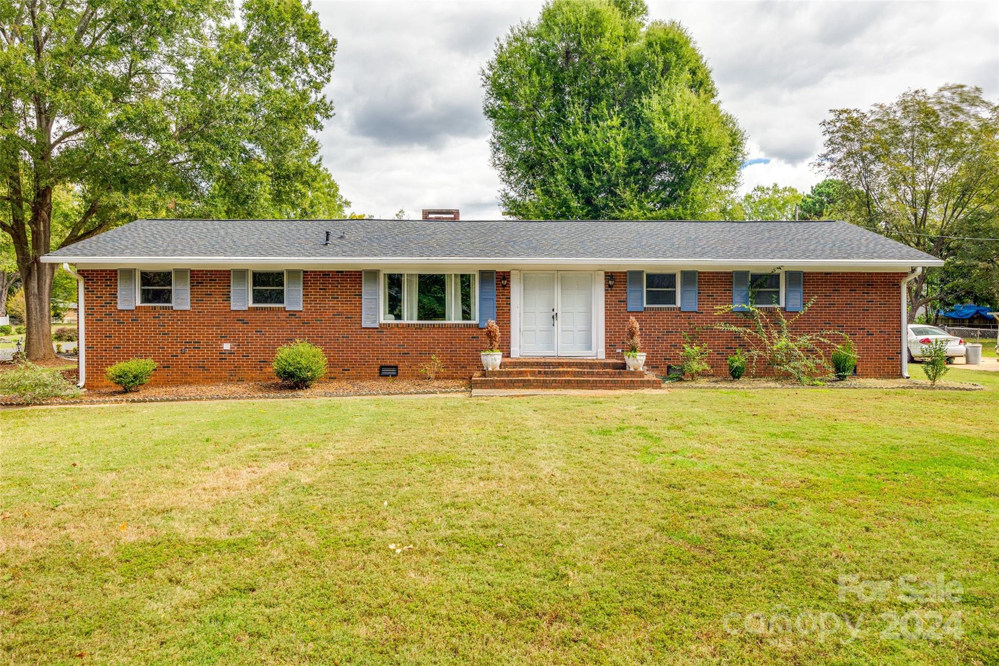 Rare opportunity to own a well-maintained brick ranch on a half acre lot with no HOA!  The hidden gem of the property lies underground, as the property has been approved to put a 2-bedroom ADU and all the septic work has been completed to accommodate the structure of your choosing; with no HOA restrictions, the second property could operate as a guest home, short-term, or long-term rental! Upgrades include: HVAC (2021), Roof (2019), Water heater (2016), Septic Improvements to accomodate 2nd structure (2024). A home warranty will be provided.