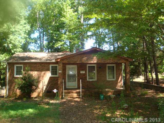 Bank Owned home, age of home is an estimate, 3 bedrooms, 2 baths, fenced yard with huge trees, great investment property