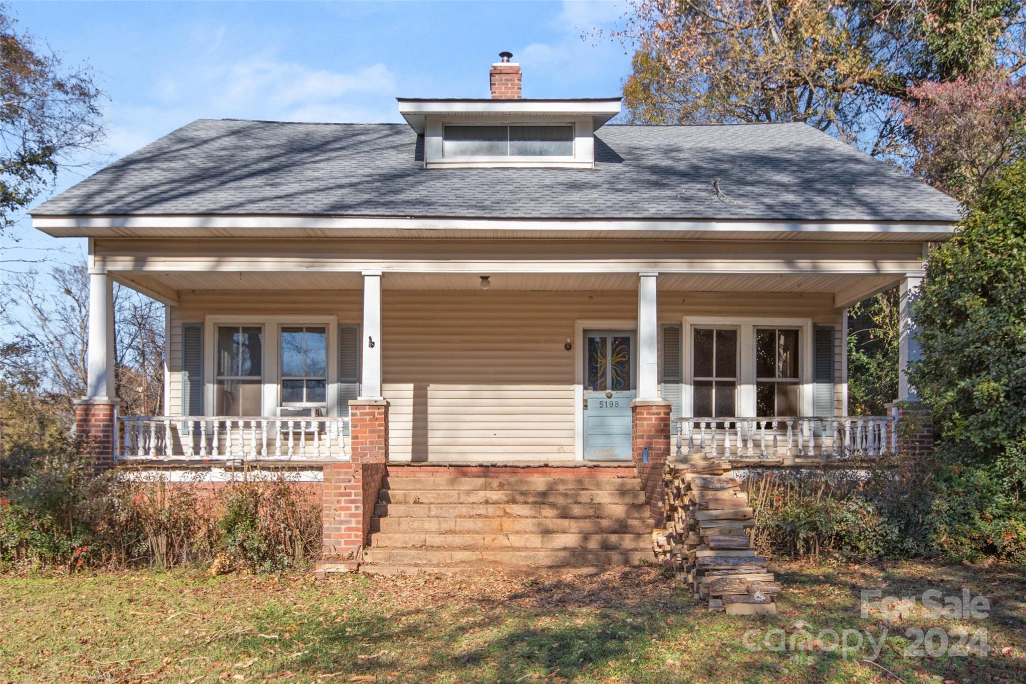 UNIQUE AND RARE INVESTORS OPPORTUNITY/HANDYMAN SPECIAL!! This beauty, built in the early 1900's, is situated on a corner lot of 0.98 acre, in the town of Van Wyck. With 11' high ceilings, wood floors and so much potential throughout, this gorgeous 1,980 sqft property is waiting for you to bring her back to her former glory. Step onto the large, covered front porch, and walk into a keeping room, and then let your imagination run wild as you decide how to utilize the space, rooms and attic area. Whether this delightful opportunity becomes your dream primary home or a secluded weekend getaway, this property offers boundless possibilities. Enjoy peace and privacy, in the Indian Land School District, yet conveniently located just a short distance from the Van Wyck Post Office and a local restaurant. Home is sold AS IS, and has no working HVAC. With newer roof and connected to well & septic system this home is waiting to be fully restored. Don't miss the brick storage shed & root cellar.