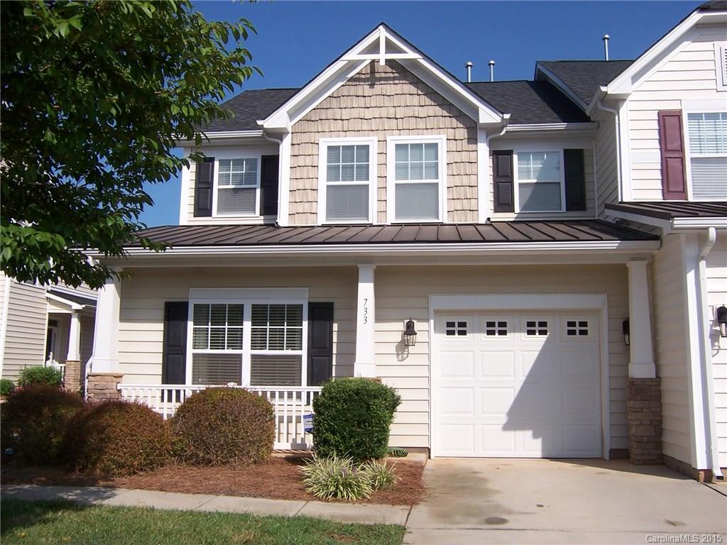 You will not believe all the space in this lovely end unit townhome.  Open floor plan with lots of upgrades.  Greatroom has hardwoods, gas fireplace and wired for surround sound.  You will love the large kitchen with a gas stove, beautiful cabinets and granite countertops.  Master bedroom on the main floor.  Two large bedrooms and a loft upstairs.  Walk in storage room, attic storage and a storage room off the deck