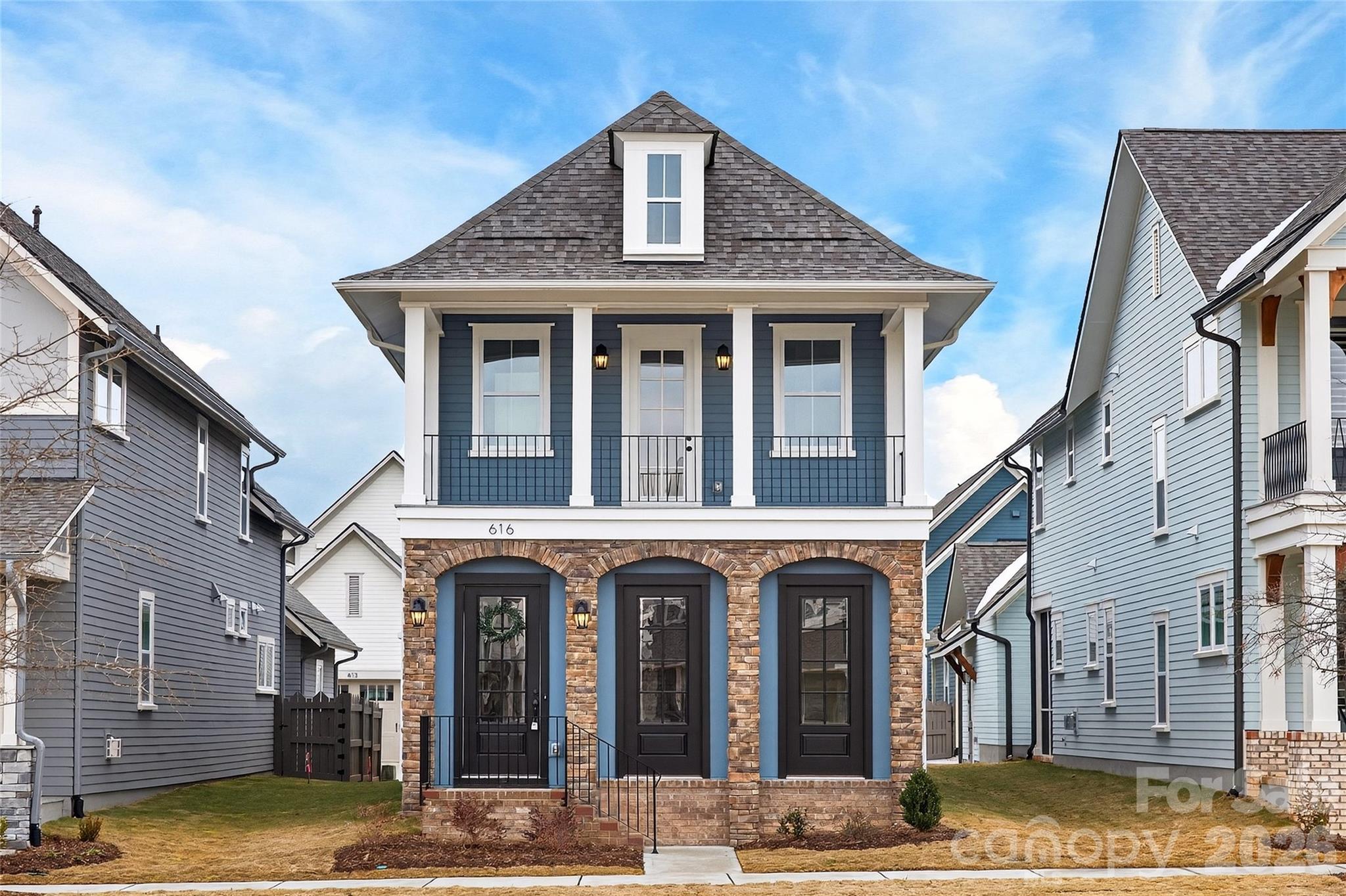 Final opportunity for a new home in Springfield Town Center. Home is under construction with an estimated December 2025 completion. This charming Cottage is conveniently located in Springfield Town Center where you can enjoy walking to local area restaurants, shops and the Harris Teeter. Features on the main level include open living with the family room leading into a beautiful kitchen with a large center island. The primary bedroom on the lower level leads out to a beautiful covered porch perfect for entertaining. A large upper front porch overlooking Promenade Park. The upper level features two spacious bedrooms, walk-in closets and one full bath. The finished loft space makes a great home office or bonus room. You don't want to miss this opportunity to own a brand new home in Fort Mill!